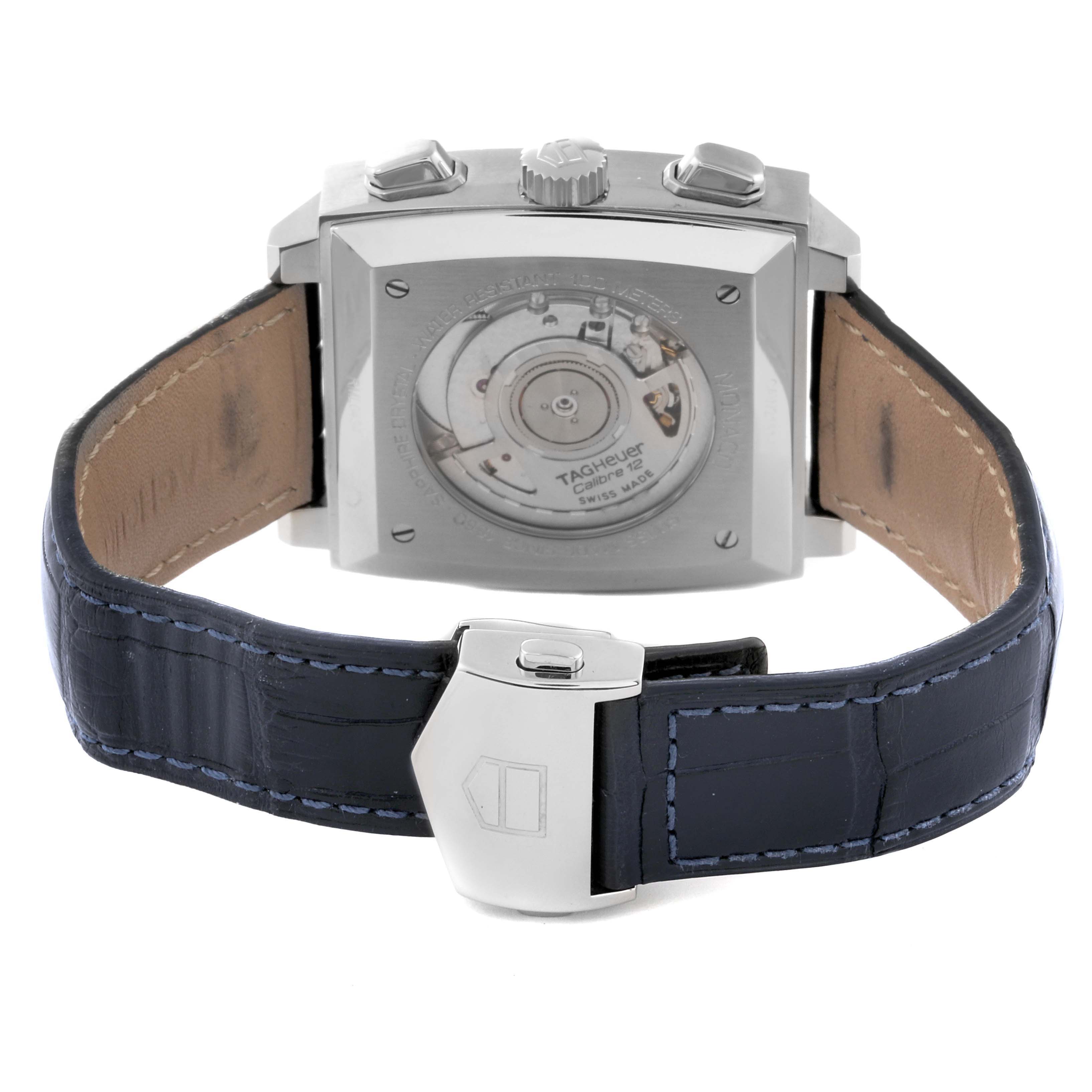 The image shows the back view of the Tag Heuer Monaco CAW2111.FC6183 Men's Stainless Steel Blue Dial CAW2111.FC6183 Men's Stainless Steel Blue Dial watch, displaying the case back and leather strap with stitching.