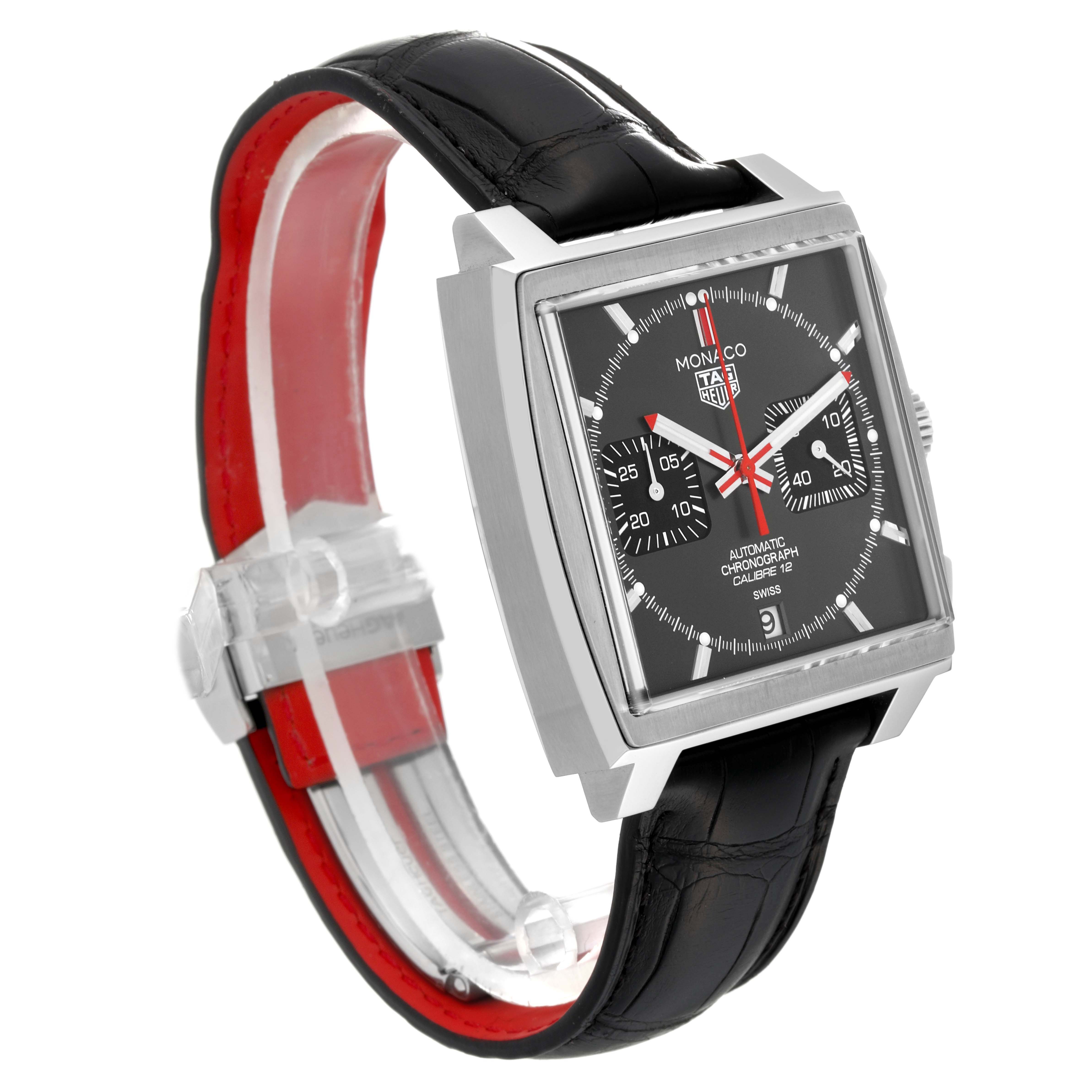 The Tag Heuer Monaco CAW211J.FC6476 Men's Stainless Steel Grey Dial watch is shown at a three-quarter angle, highlighting the black face, chronograph dials, and black leather strap.