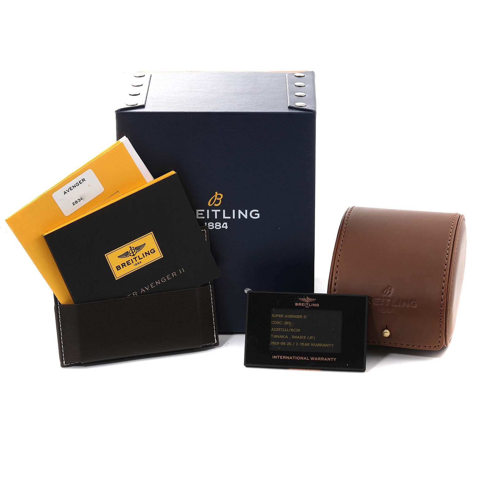 The image shows the packaging, warranty card, and manuals for a Breitling Avenger A13371 Men's Stainless Steel Black Dial A13371 Men's Stainless Steel Black Dial watch.