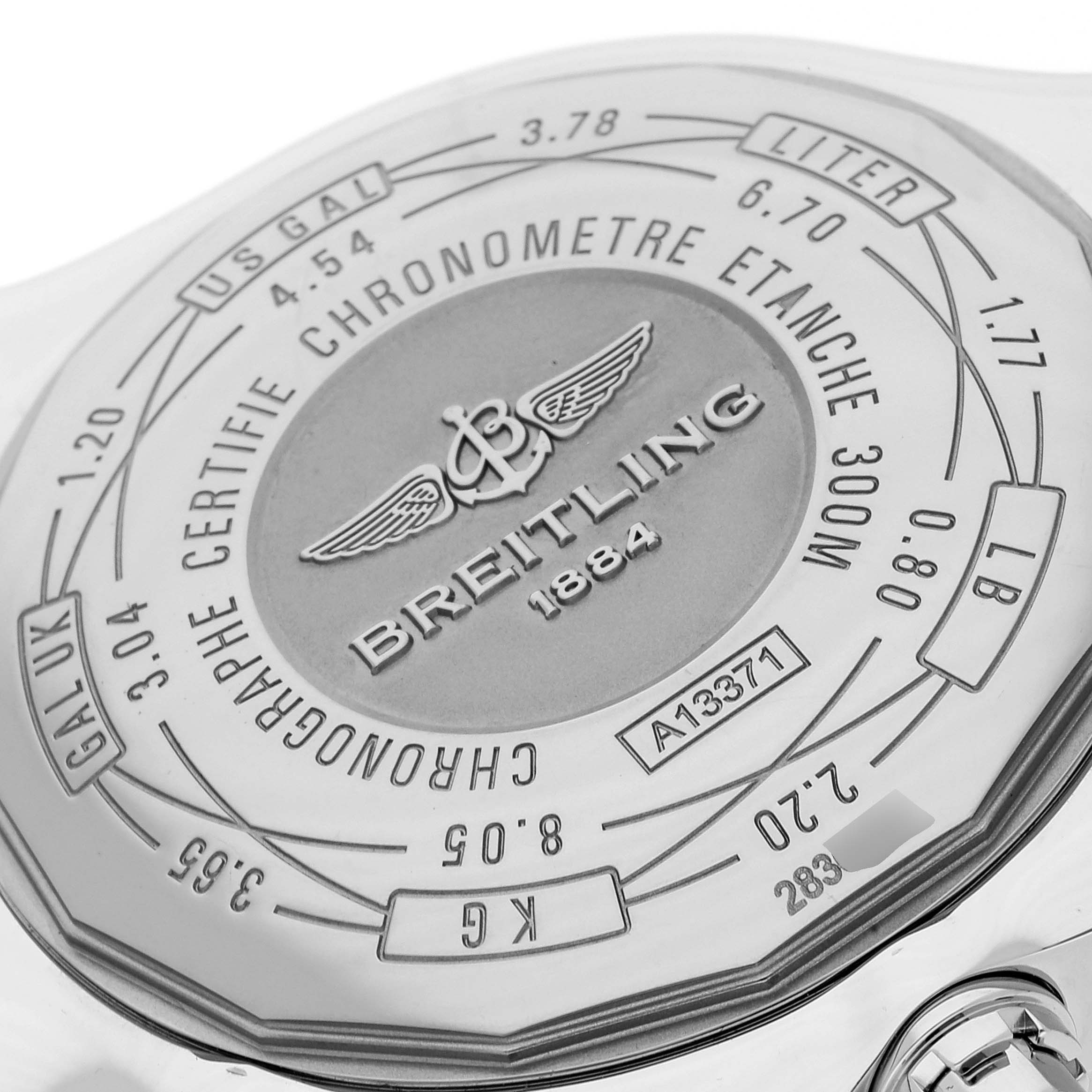 The image shows the back case of a Breitling Avenger A13371 Men's Stainless Steel Black Dial A13371 Men's Stainless Steel Black Dial watch, highlighting its engravings and specifications.