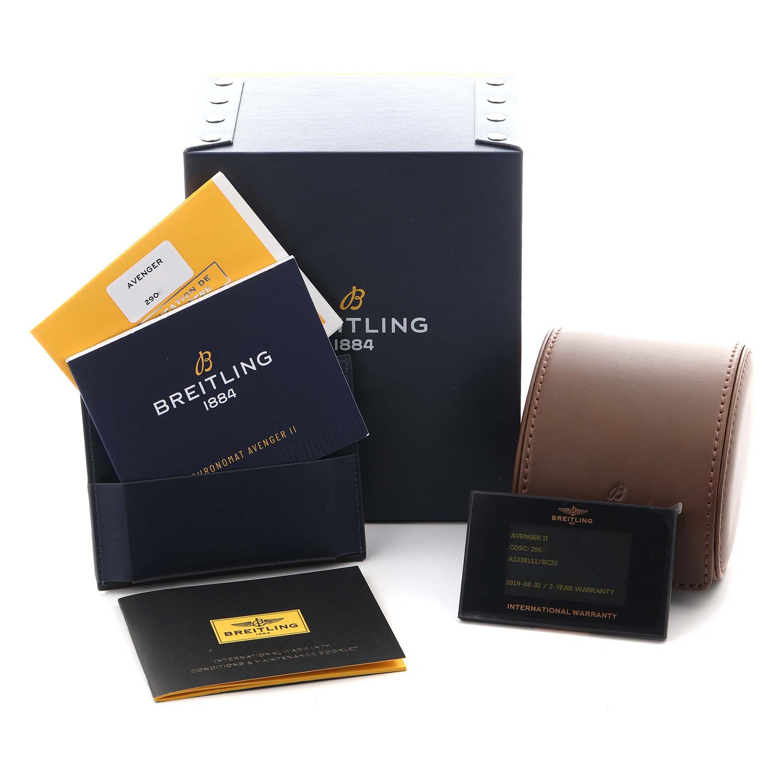The image shows packaging and accessories for a Breitling Avenger A13381 Men
s Stainless Steel Black Dial A13381 Men
s Stainless Steel Black Dial watch, including boxes, manuals, and a warranty card.