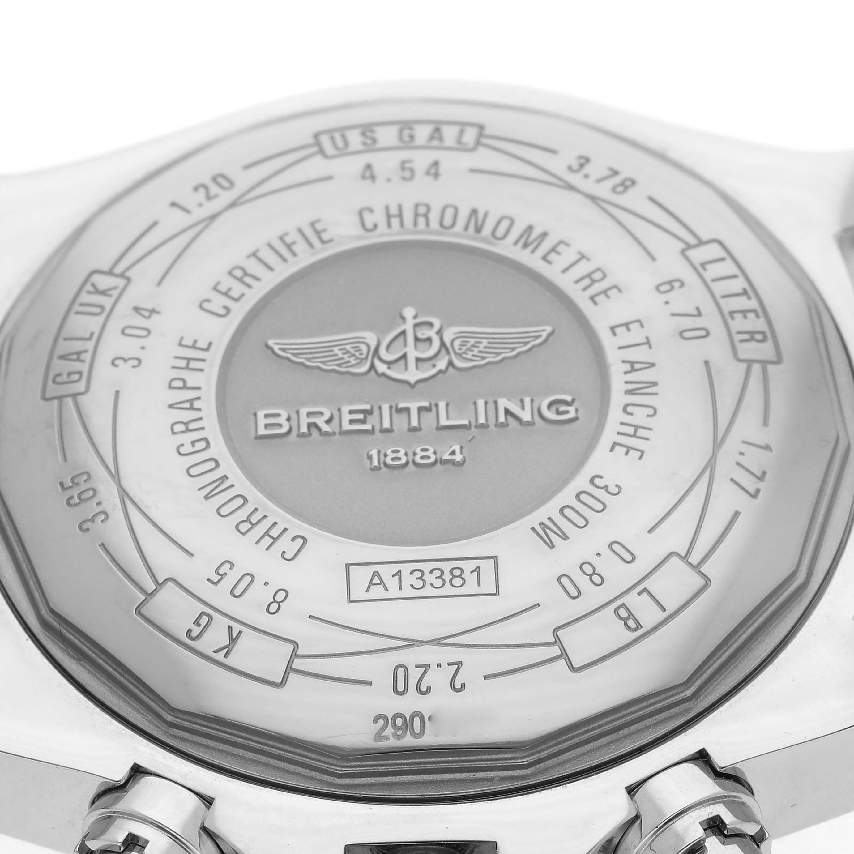 The image shows the case back of a Breitling Avenger A13381 Men
s Stainless Steel Black Dial A13381 Men
s Stainless Steel Black Dial, featuring engravings and specifications.