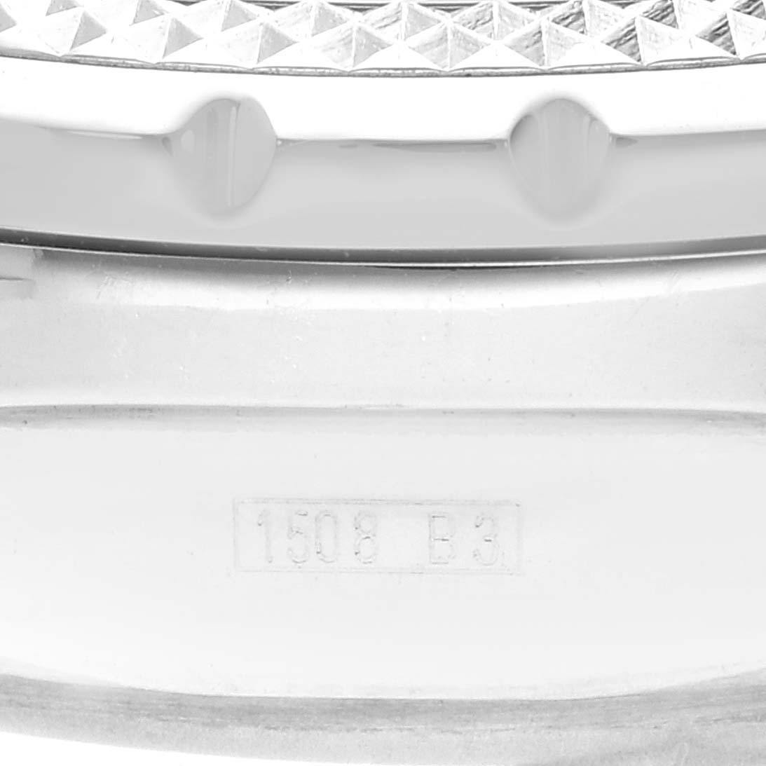The image shows a close-up of the bezel and part of the case back of a Bentley model by Breitling watch.
