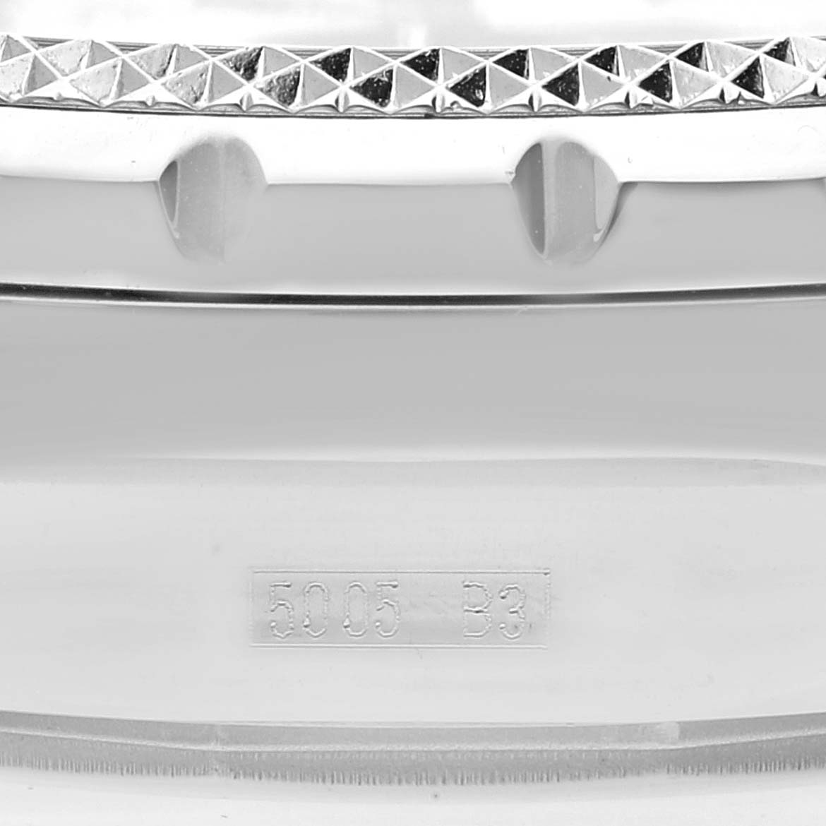 The image shows a close-up of the bezel and part of the casing with inscriptions of the Bentley model by Breitling.