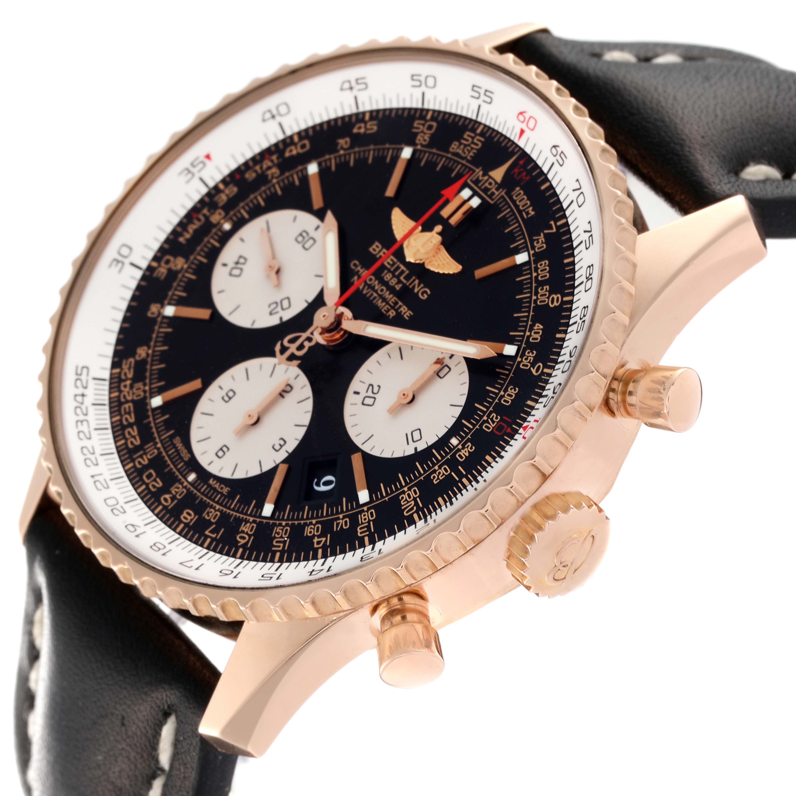 The image shows the dial, crown, pushers, and part of the strap of a Breitling Navitimer RB0120 Men
s Rose Gold Black Dial RB0120 Men
s Rose Gold Black Dial watch, viewed from an angled side perspective.