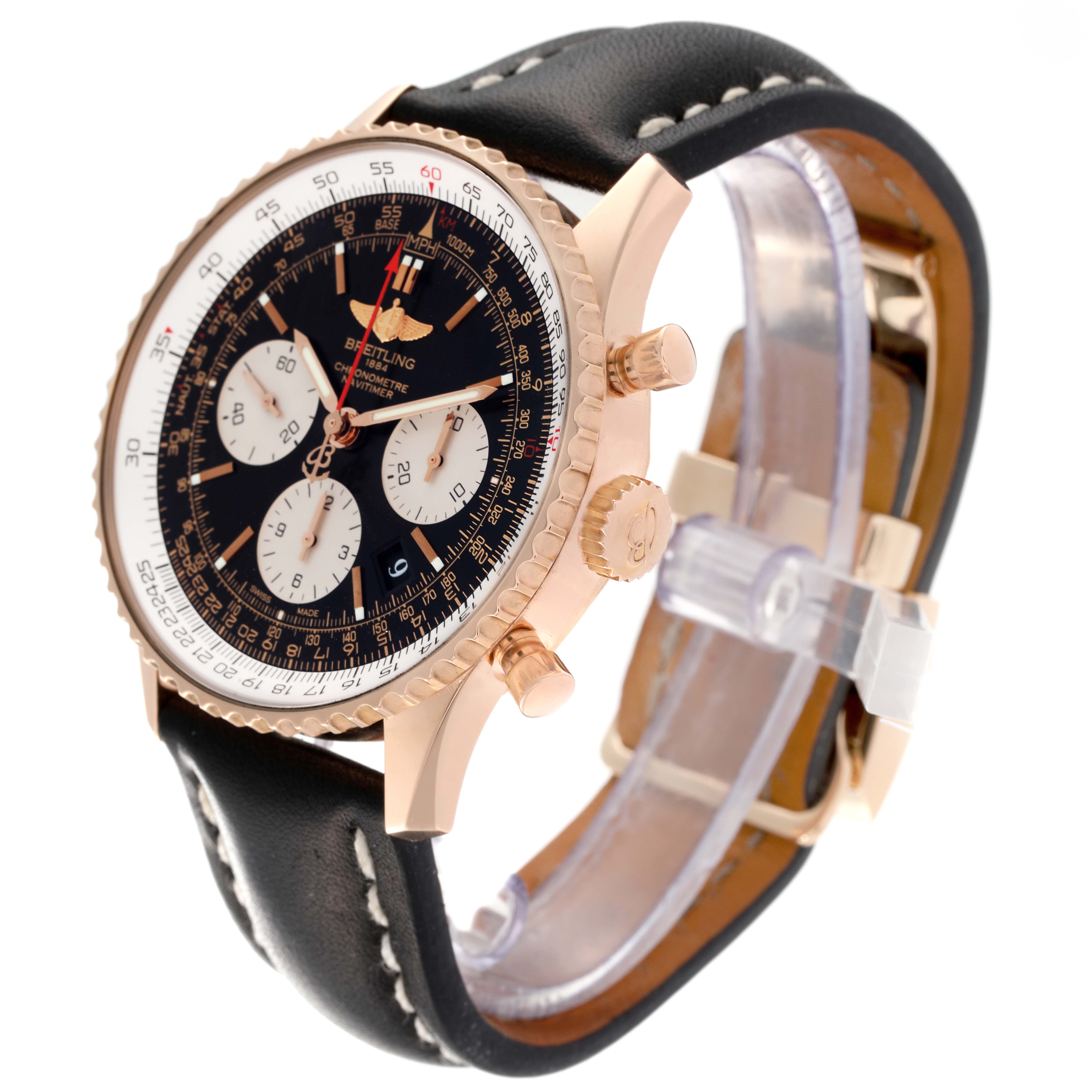 The image shows a side angle of a Breitling Navitimer RB0120 Men
s Rose Gold Black Dial RB0120 Men
s Rose Gold Black Dial watch, highlighting its face, leather strap, and rose gold case with pushers and crown.