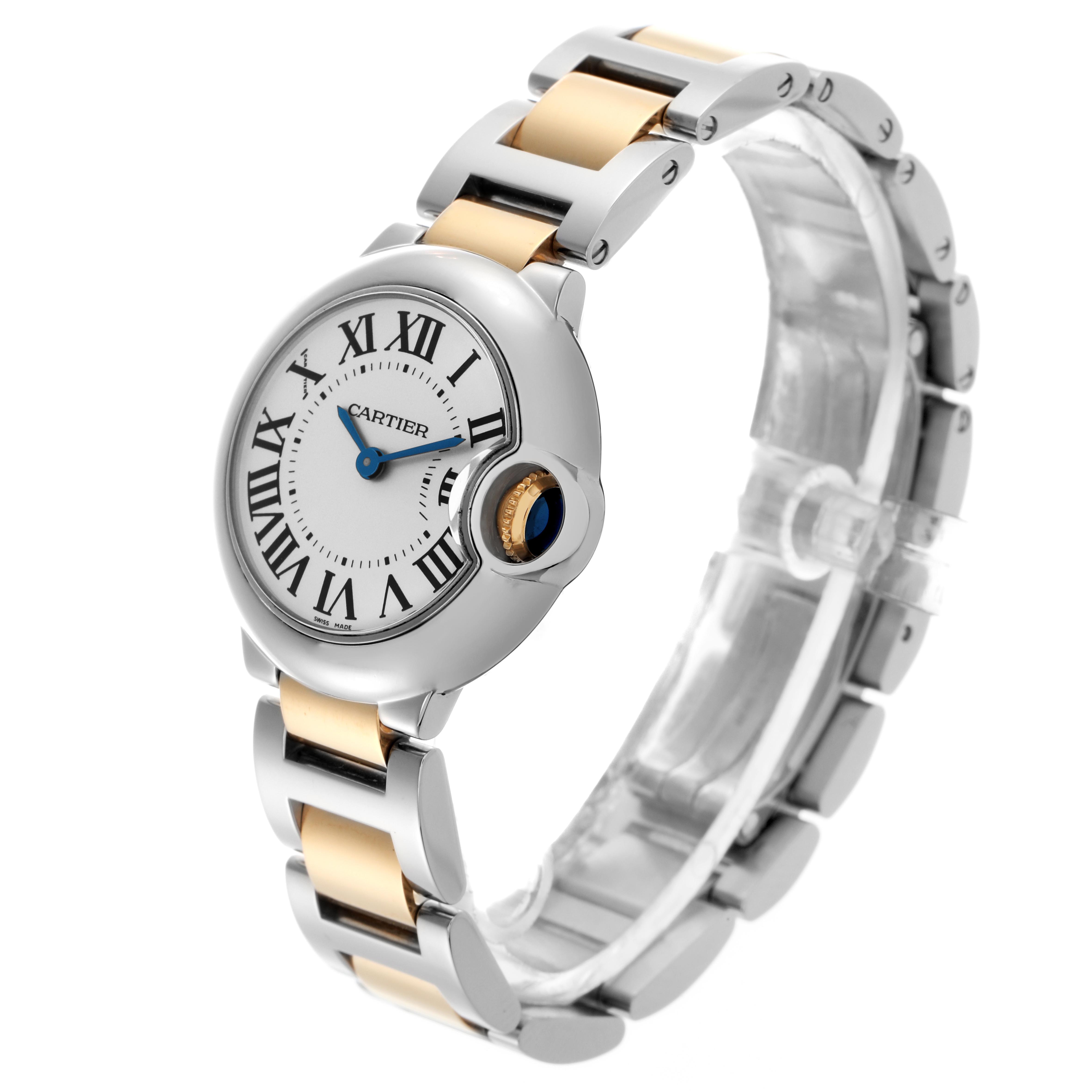 The Cartier Ballon Bleu W69007Z3 Women
s Steel and Gold (two tone) Silver Dial W69007Z3 Women
s Steel and Gold (two tone) Silver Dial watch is shown from an angled side view, highlighting its round face, Roman numerals, and two-tone bracelet.