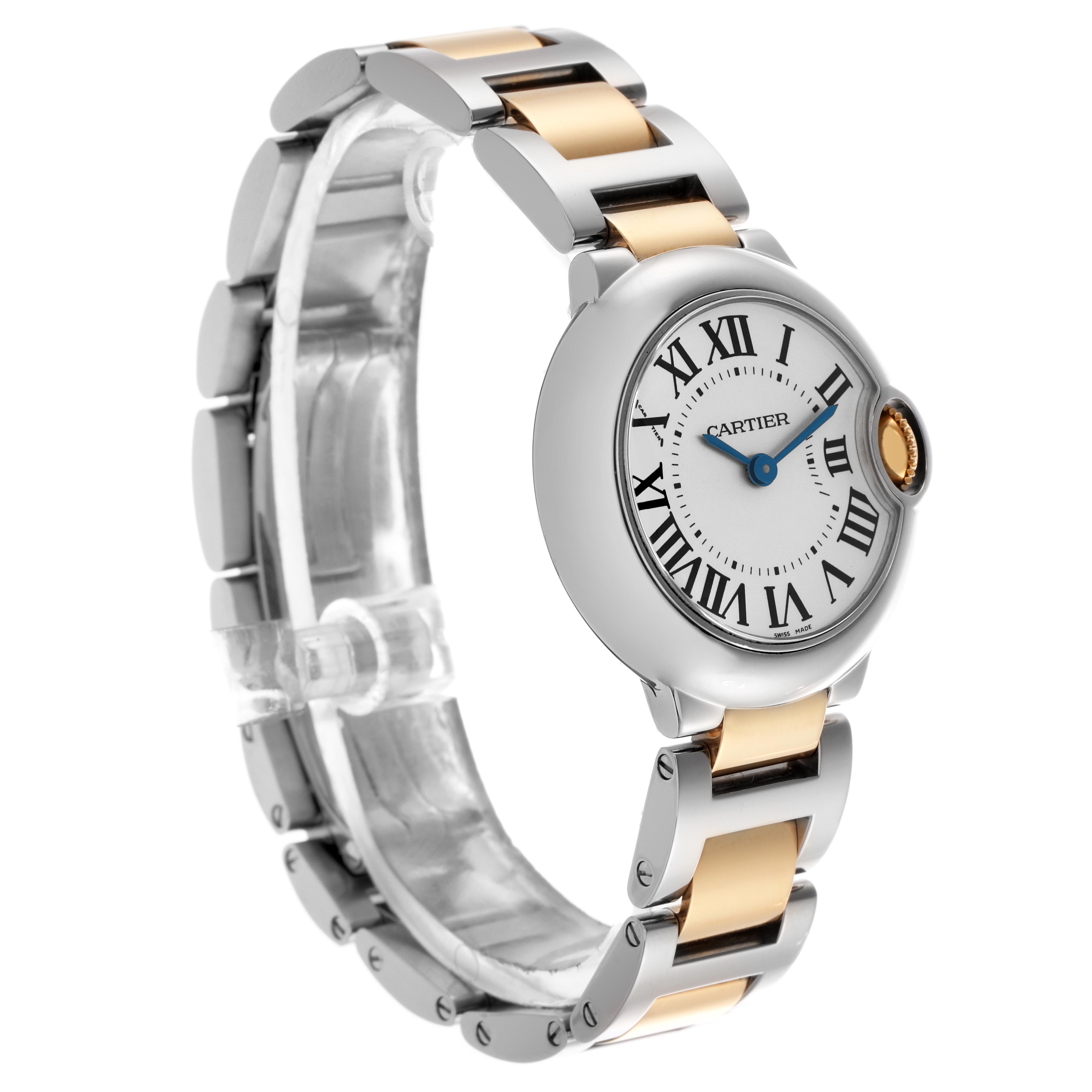 The Cartier Ballon Bleu W69007Z3 Women
s Steel and Gold (two tone) Silver Dial W69007Z3 Women
s Steel and Gold (two tone) Silver Dial watch is shown from a three-quarter angle, highlighting its face, case, and two-tone bracelet.