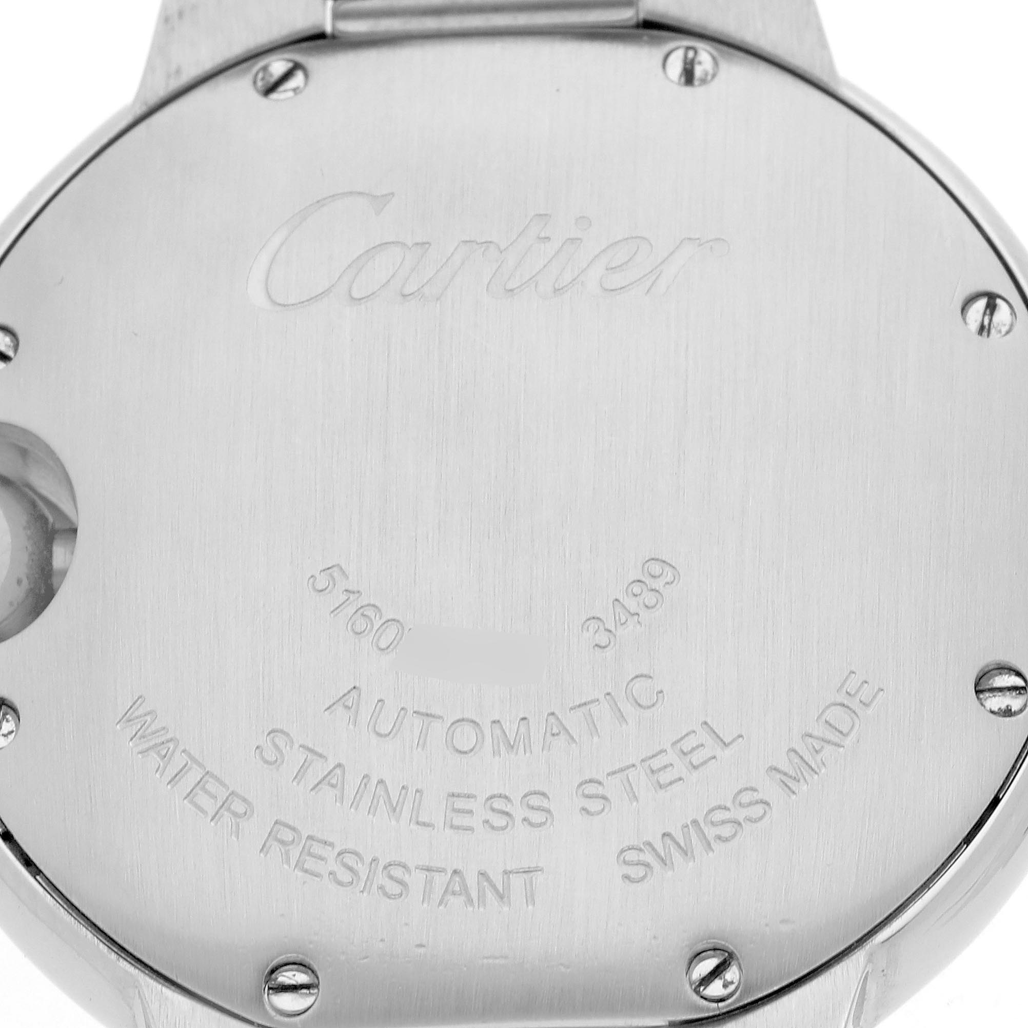 The image shows the back of a Cartier Ballon Bleu WE902074 Women
s Stainless Steel Silver Dial WE902074 Women
s Stainless Steel Silver Dial watch, highlighting engraving details and screws.