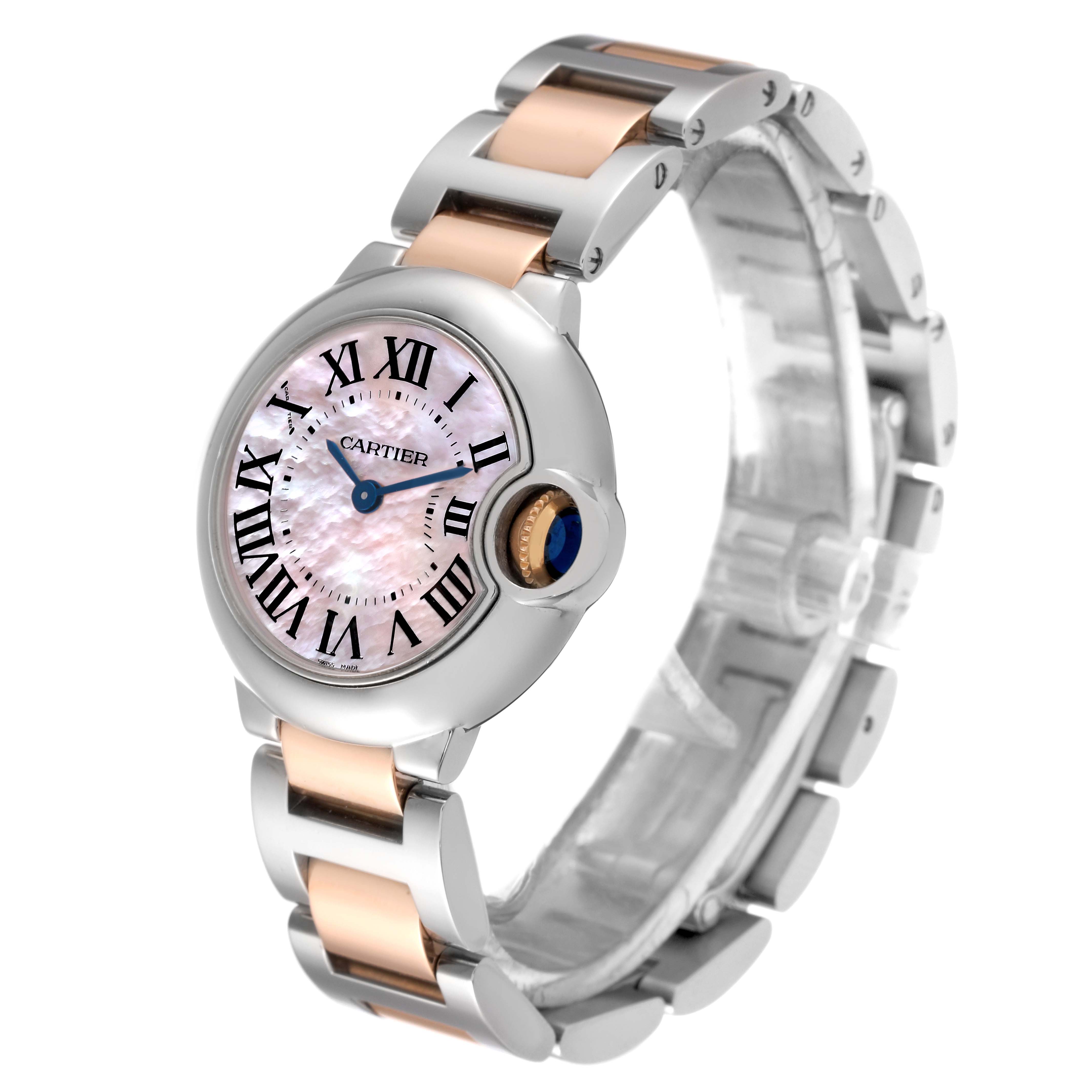 The image shows a Ballon Bleu model by Cartier from a three-quarter angle, highlighting the watch face and bracelet.