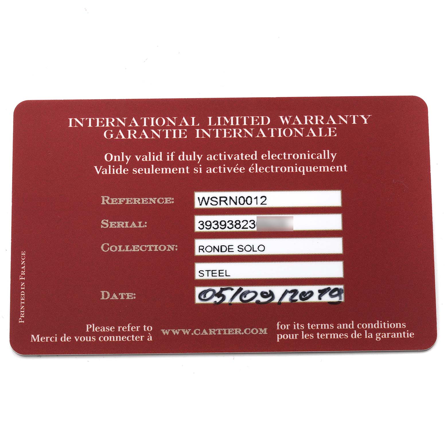 The image shows an international limited warranty card for the Cartier Ronde WSRN0012 Men
s Stainless Steel Silver Dial WSRN0012 Men
s Stainless Steel Silver Dial Solo watch model.