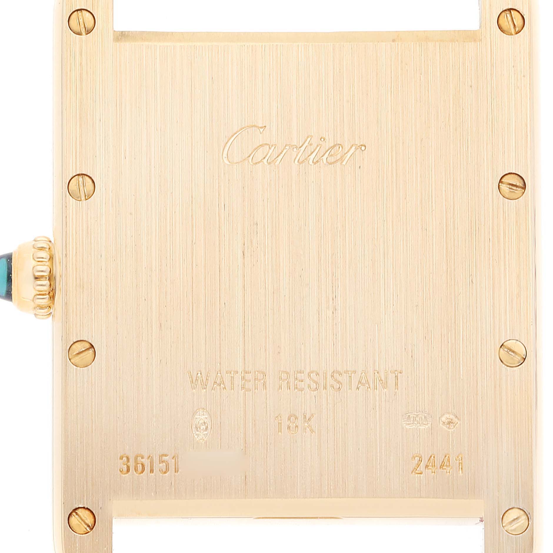 This image shows the back case of a Cartier Tank Louis W1529756 Men's Yellow Gold Silver Dial W1529756 Men's Yellow Gold Silver Dial watch, highlighting the brand's engraving, screws, and crown.