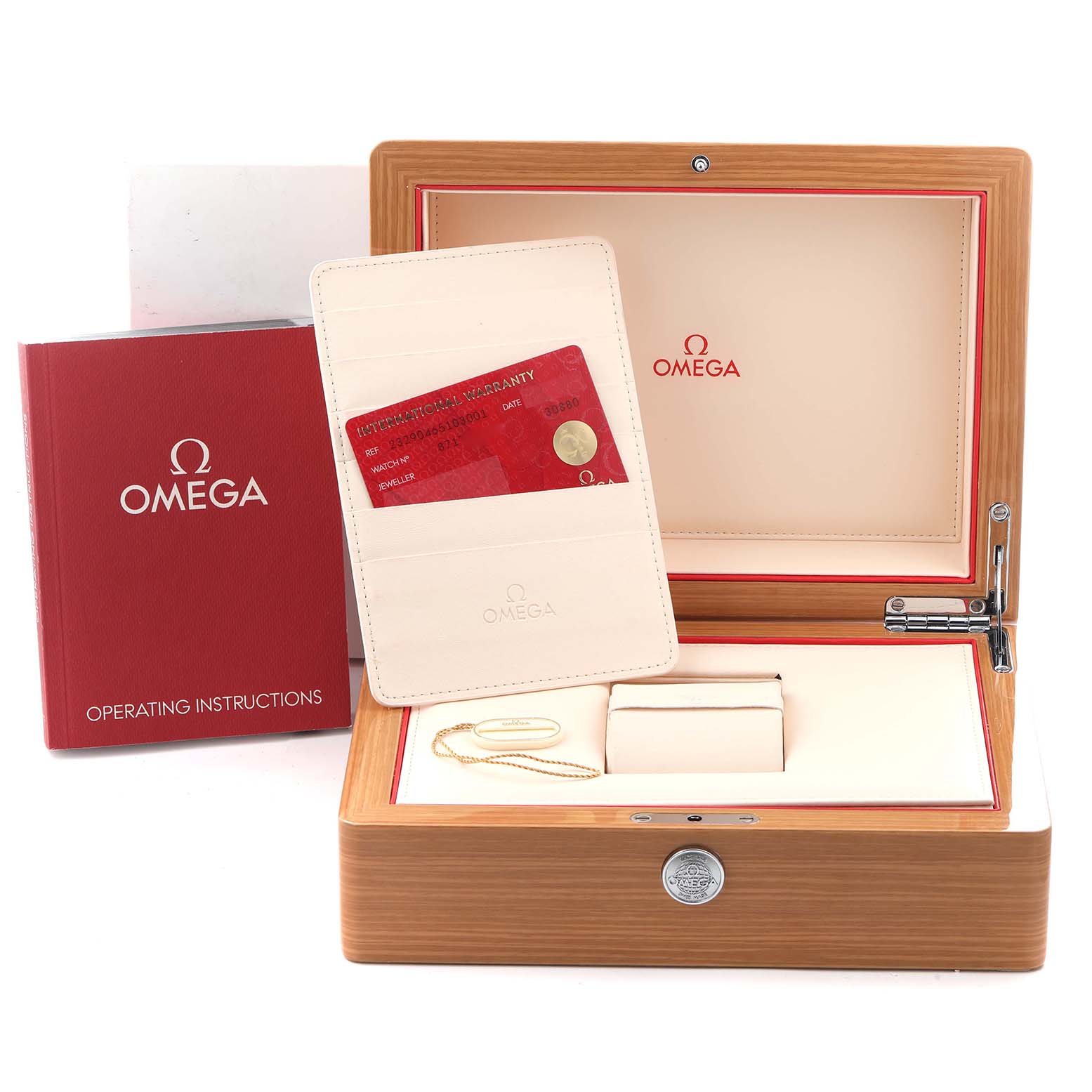 The image shows an open Omega Planet Ocean 232.90.46.51.03.001 Men
s Titanium Blue Dial 232.90.46.51.03.001 Men
s Titanium Blue Dial watch box with warranty cards and an instruction manual.