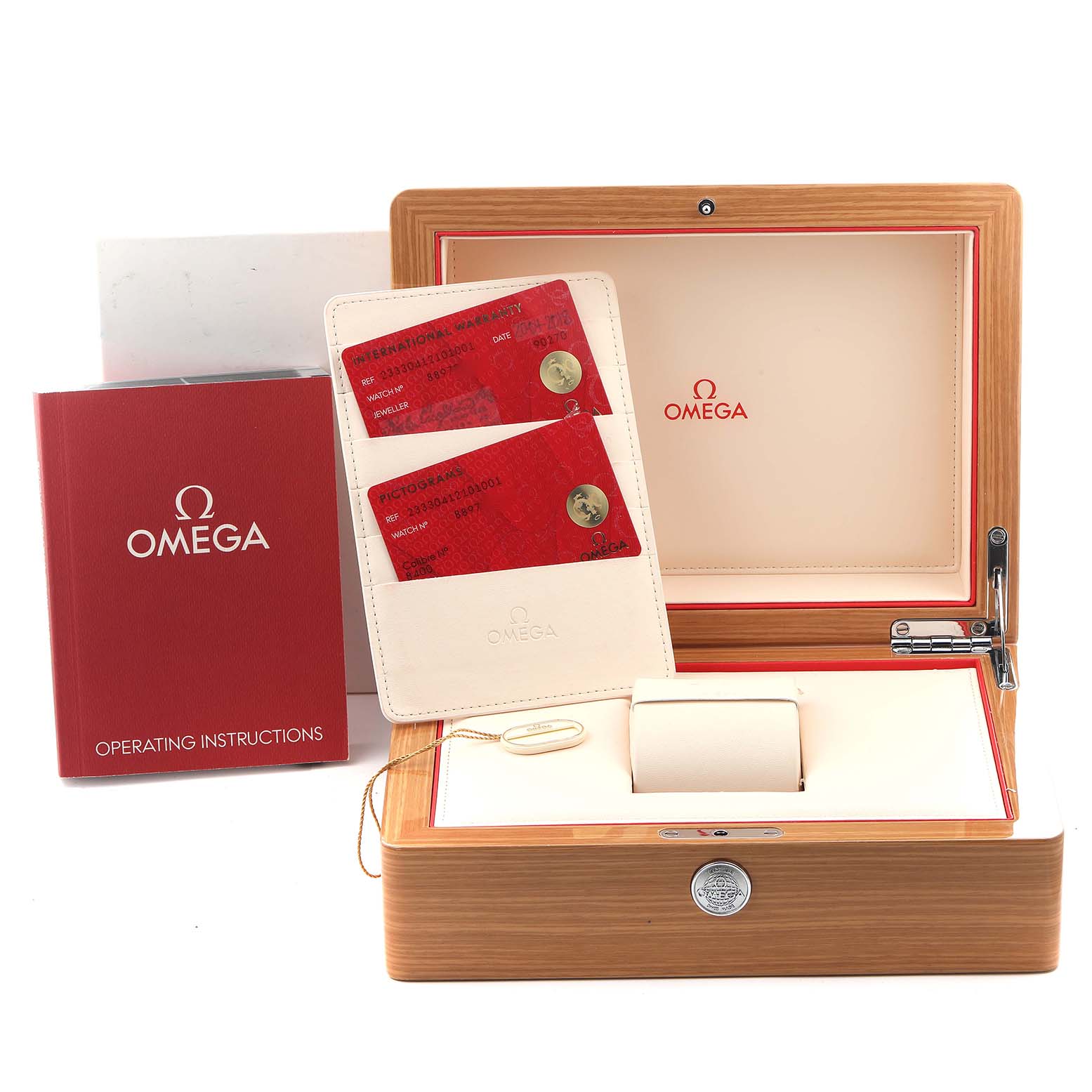 The image shows an open Omega Seamaster 233.30.41.21.01.001 Men
s Stainless Steel Black Dial 233.30.41.21.01.001 Men
s Stainless Steel Black Dial box, operating instructions, and two red cards in a holder.