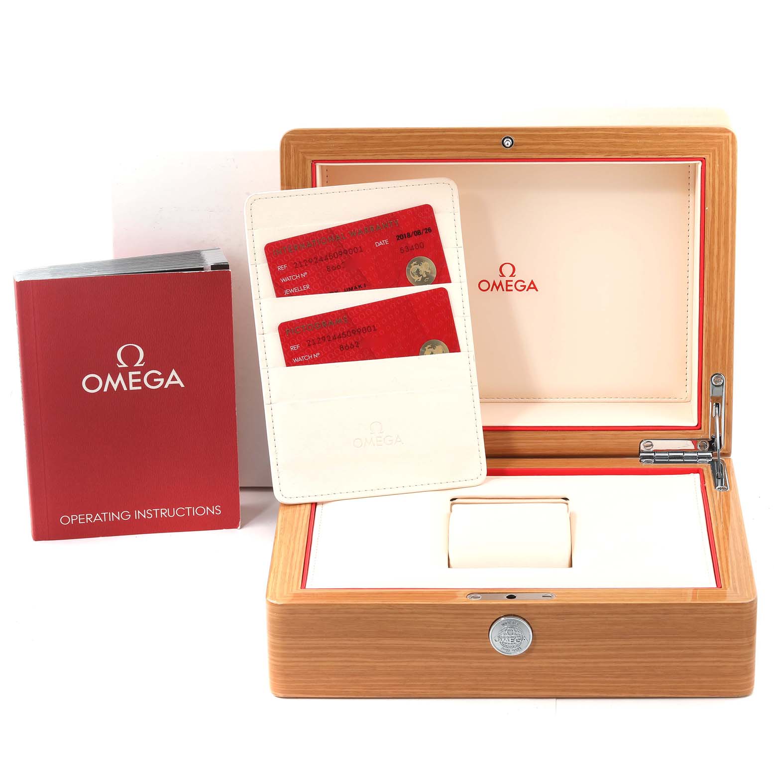 The image shows an Omega Seamaster 212.92.44.50.99.001 Men's Titanium Grey Dial 212.92.44.50.99.001 Men's Titanium Grey Dial watch box, operating instructions, and warranty cards.