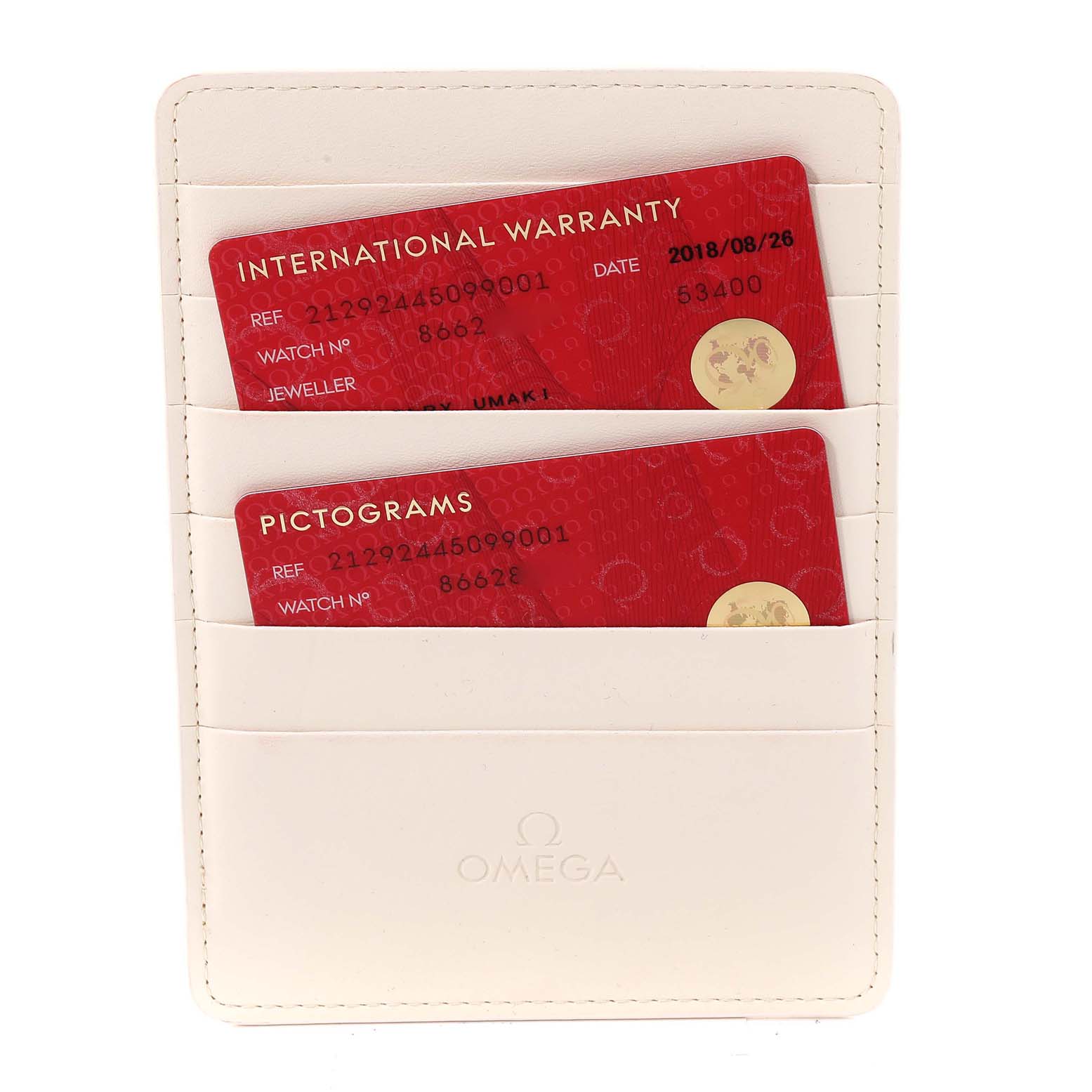 The image shows an Omega Seamaster 212.92.44.50.99.001 Men's Titanium Grey Dial 212.92.44.50.99.001 Men's Titanium Grey Dial warranty card holder with international warranty and pictograms cards.