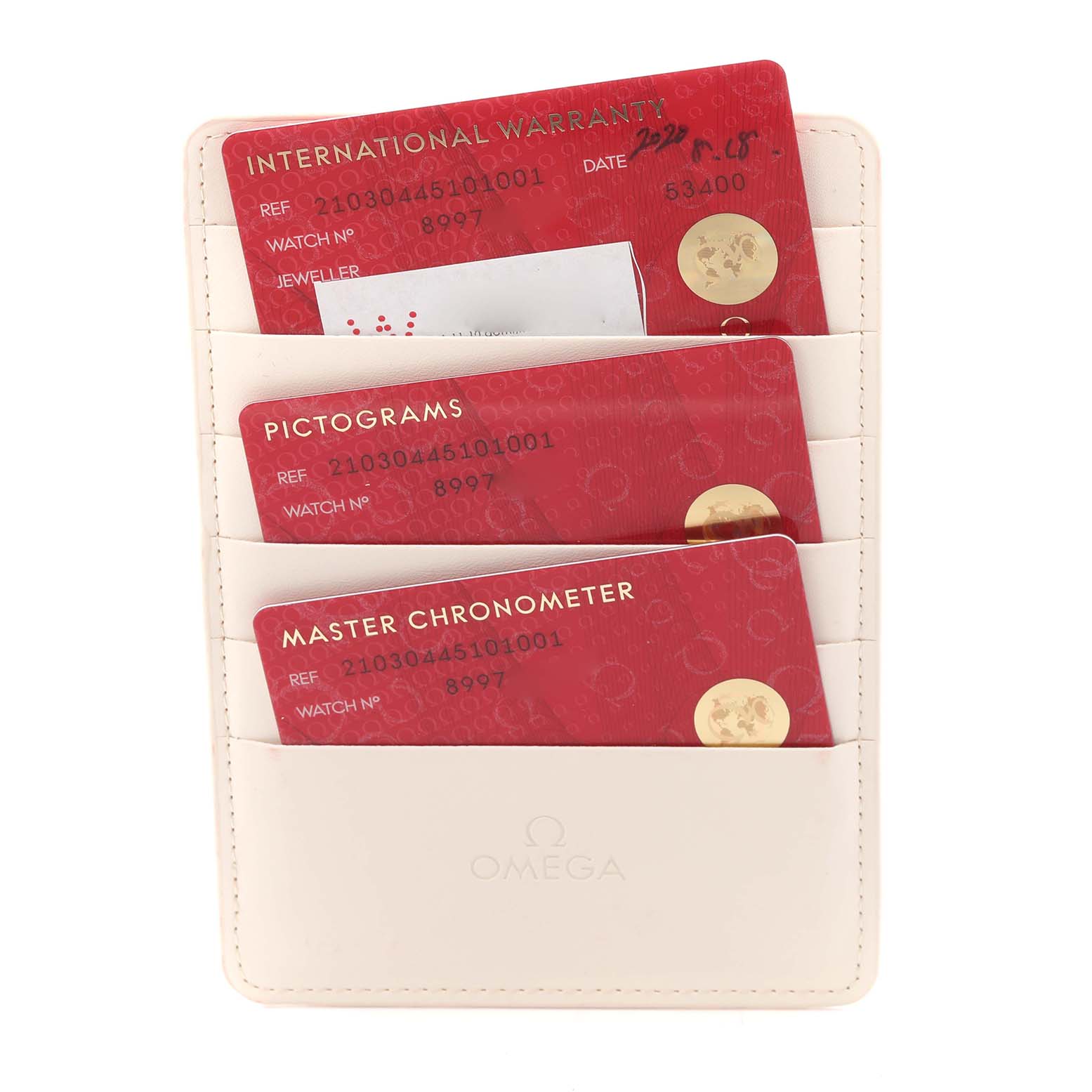 The image shows Omega Seamaster 210.30.44.51.01.001 Men
s Stainless Steel Black Dial 210.30.44.51.01.001 Men
s Stainless Steel Black Dial model warranty cards in a holder, viewed from above.