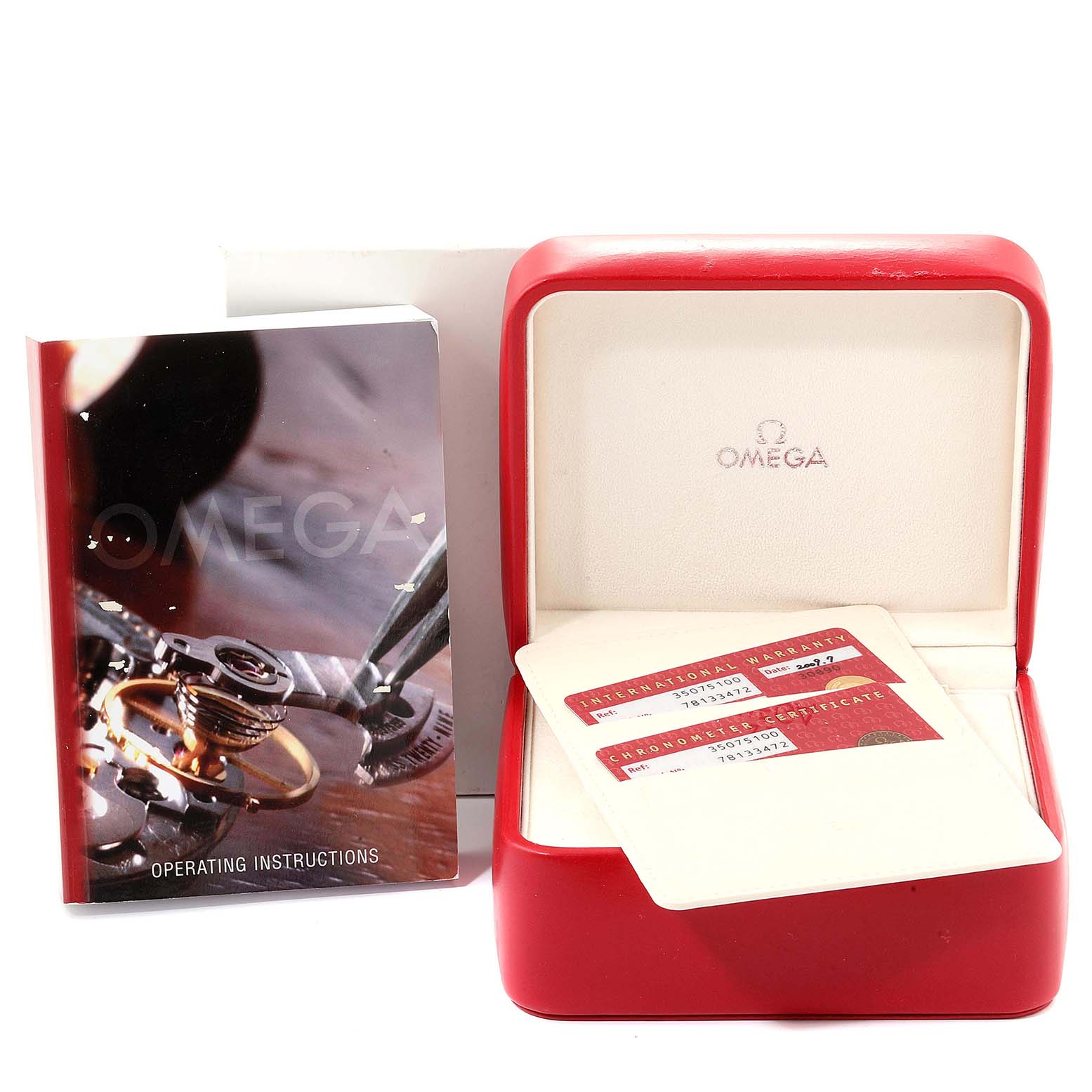 The image shows the Omega Speedmaster 3507.51.00 Men
s Stainless Steel Black Dial 3507.51.00 Men
s Stainless Steel Black Dial watch
s red box, instruction manual, and warranty cards.