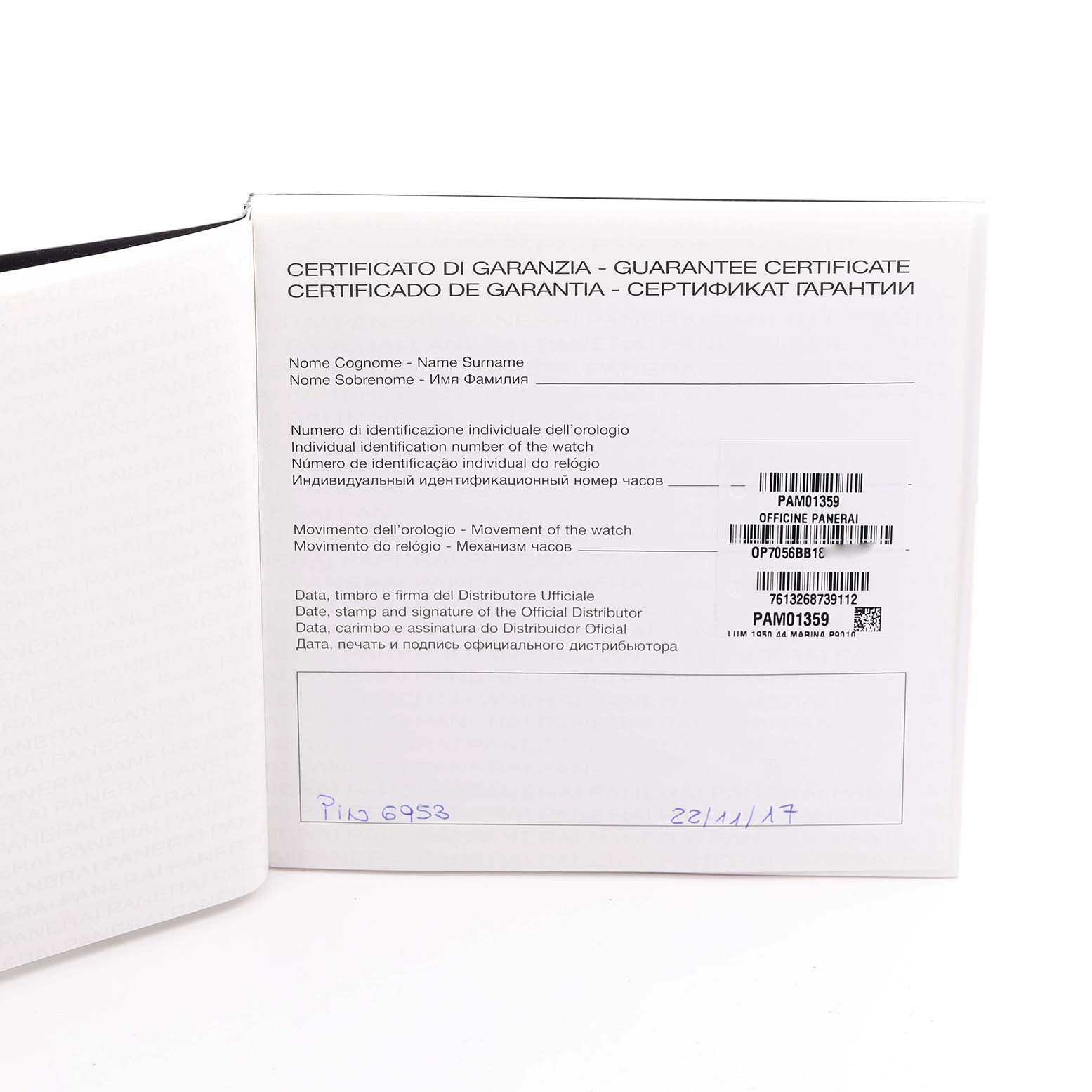 The image shows a guarantee certificate for a Panerai Luminor PAM01359 Men
s Stainless Steel Black Dial PAM01359 Men
s Stainless Steel Black Dial watch open, displaying text and barcodes.