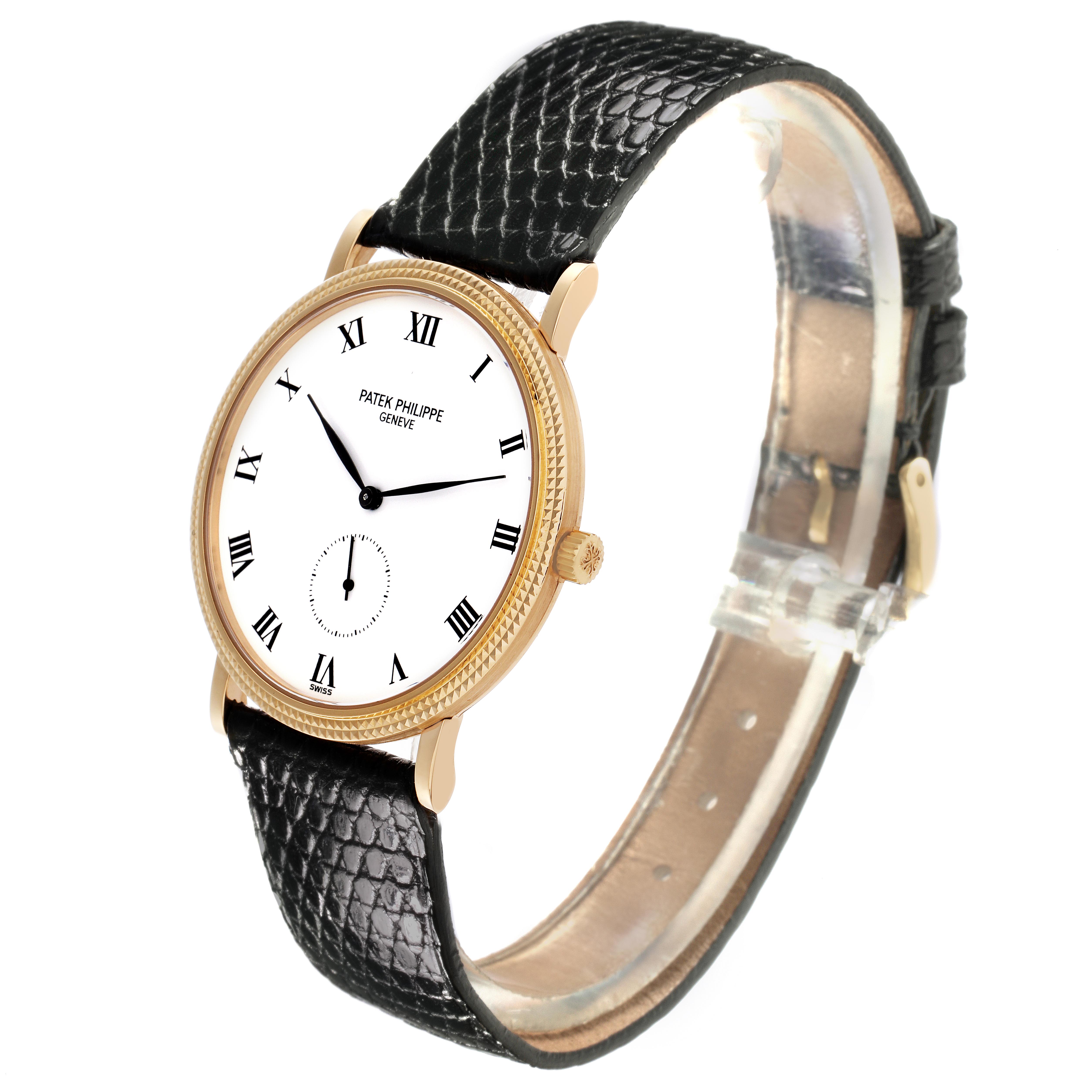 The Patek Philippe Calatrava 3919J-001 Men
s Yellow Gold White Dial 3919J-001 Men
s Yellow Gold White Dial watch is shown at a angled profile, displaying the face, bezel, crown, and strap.