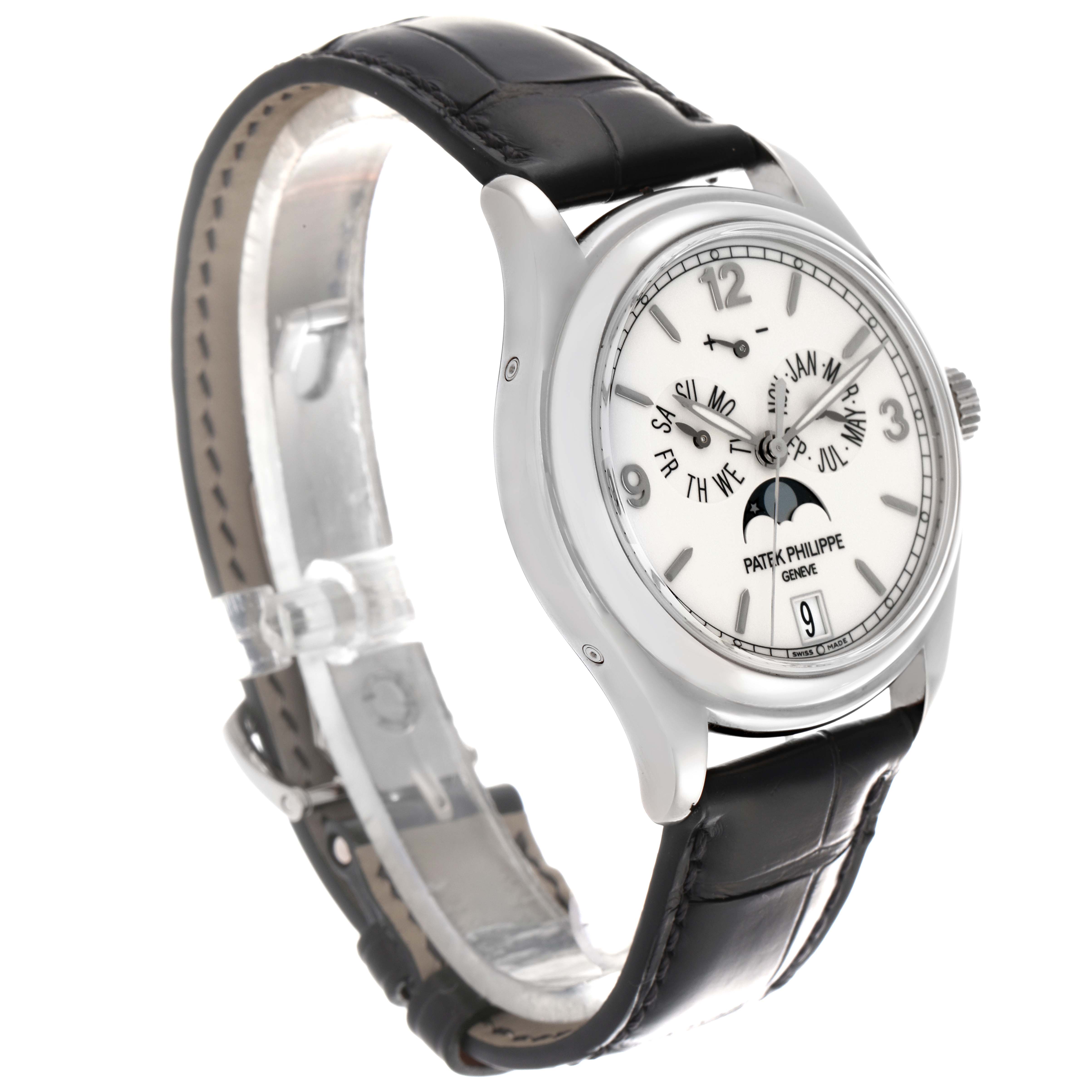 The Patek Philippe Complications 5146G Men
s White Gold White Dial 5146G Men
s White Gold White Dial watch is shown at a slight angle, displaying its dial, case, crown, and leather strap.
