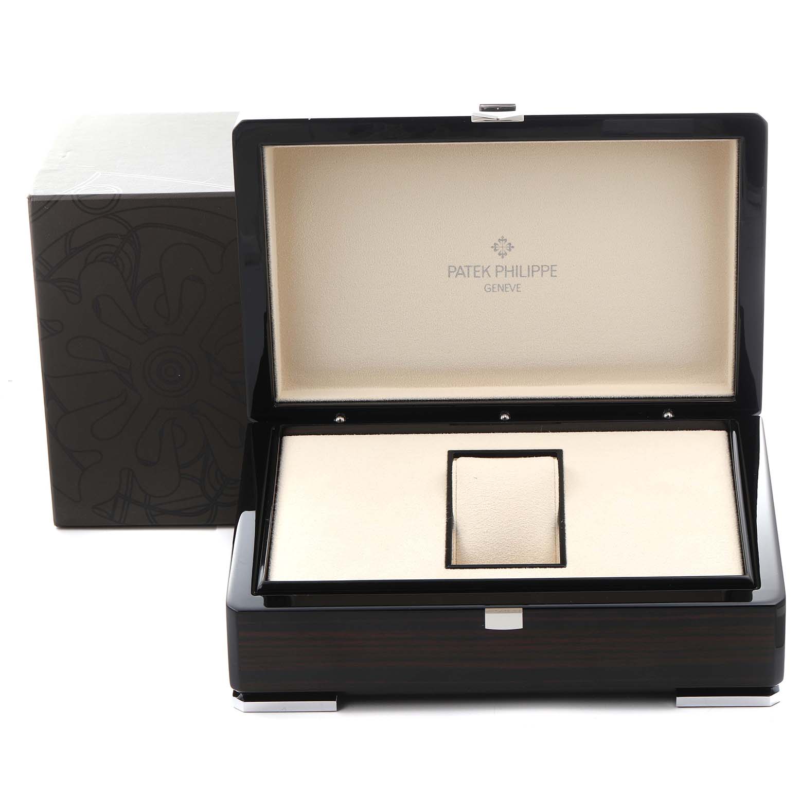 The image shows the open case for a Patek Philippe Complications 5146G Men
s White Gold White Dial 5146G Men
s White Gold White Dial watch, highlighting its interior with brand branding.