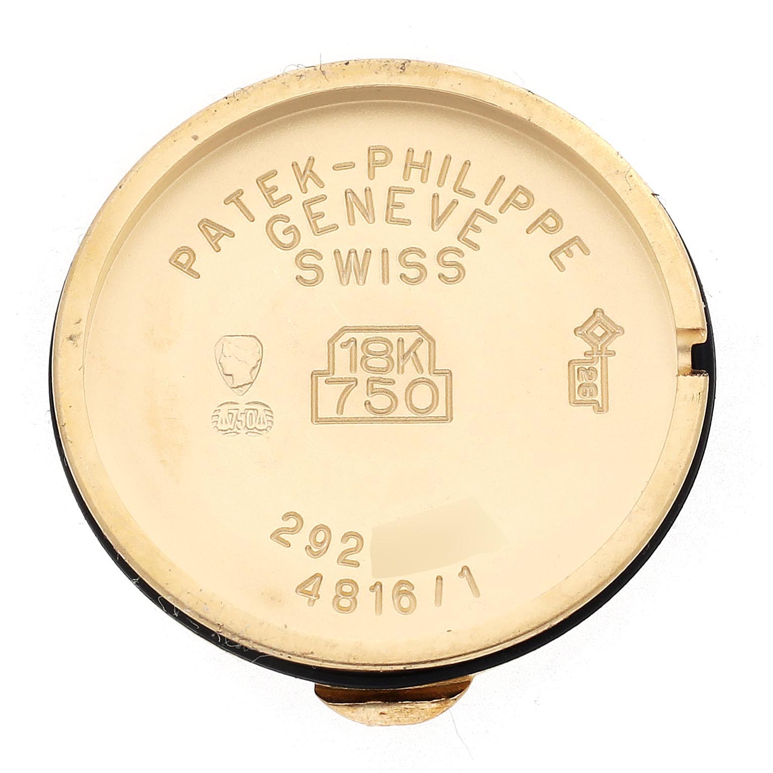 The image shows the back case of a Patek Philippe La Flamme  4816/1 Women
s Yellow Gold White Dial 4816/1 Women
s Yellow Gold White Dialwatch, marked with "18K 750" and other engravings.