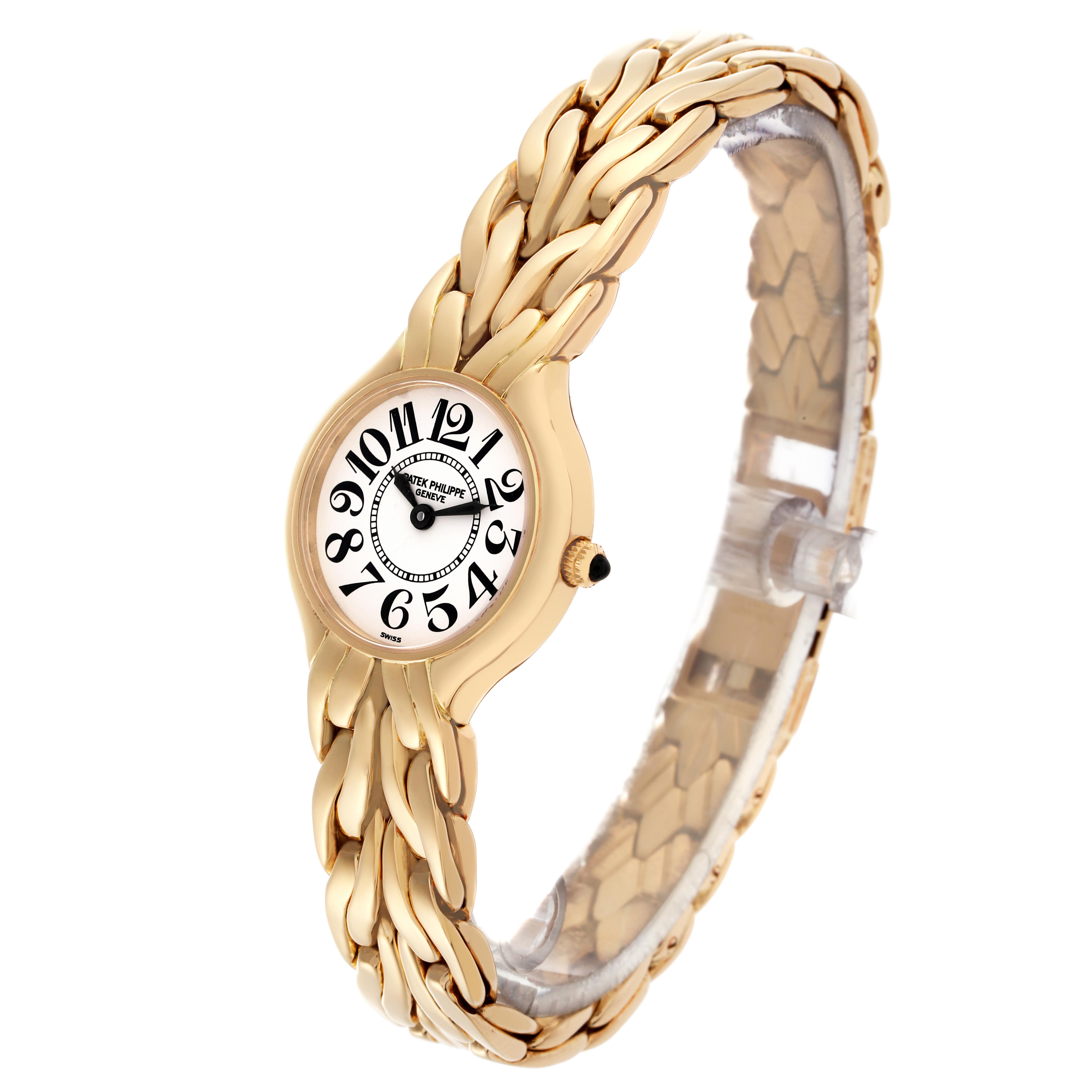 The Patek Philippe La Flamme  4816/1 Women
s Yellow Gold White Dial 4816/1 Women
s Yellow Gold White Dialwatch is shown at a three-quarter angle, displaying its dial and the distinct gold bracelet.