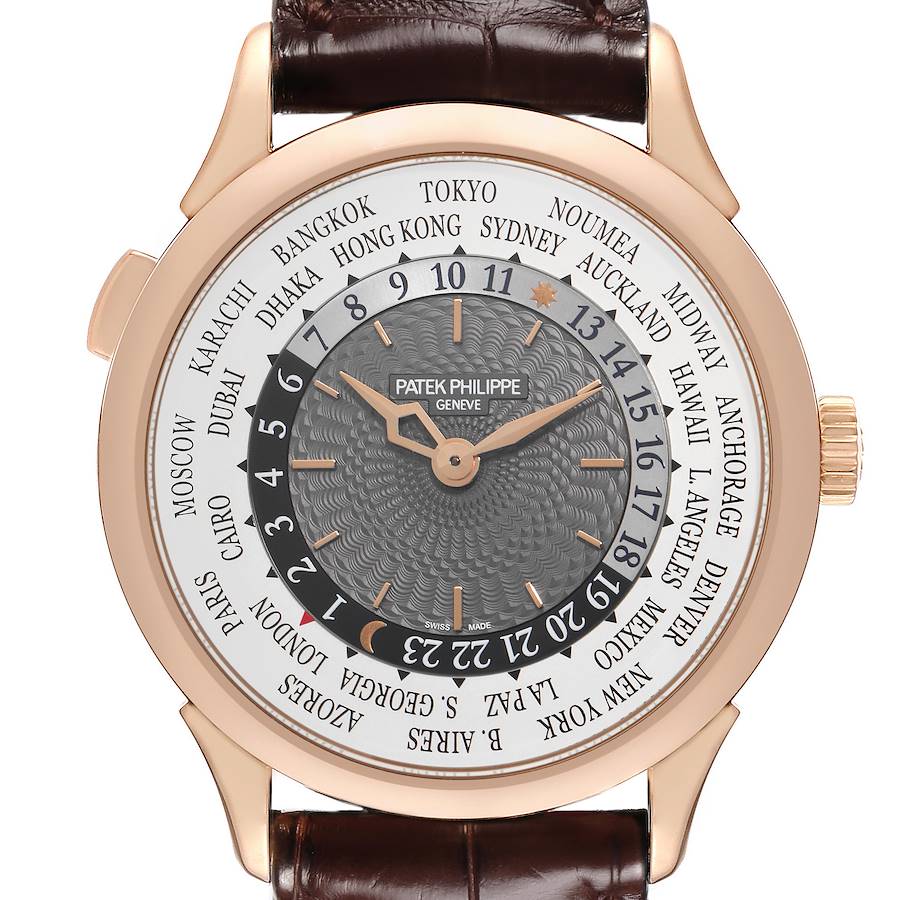 The Patek Philippe Complications watch is shown from the front, displaying the dial with cities and a brown leather strap.