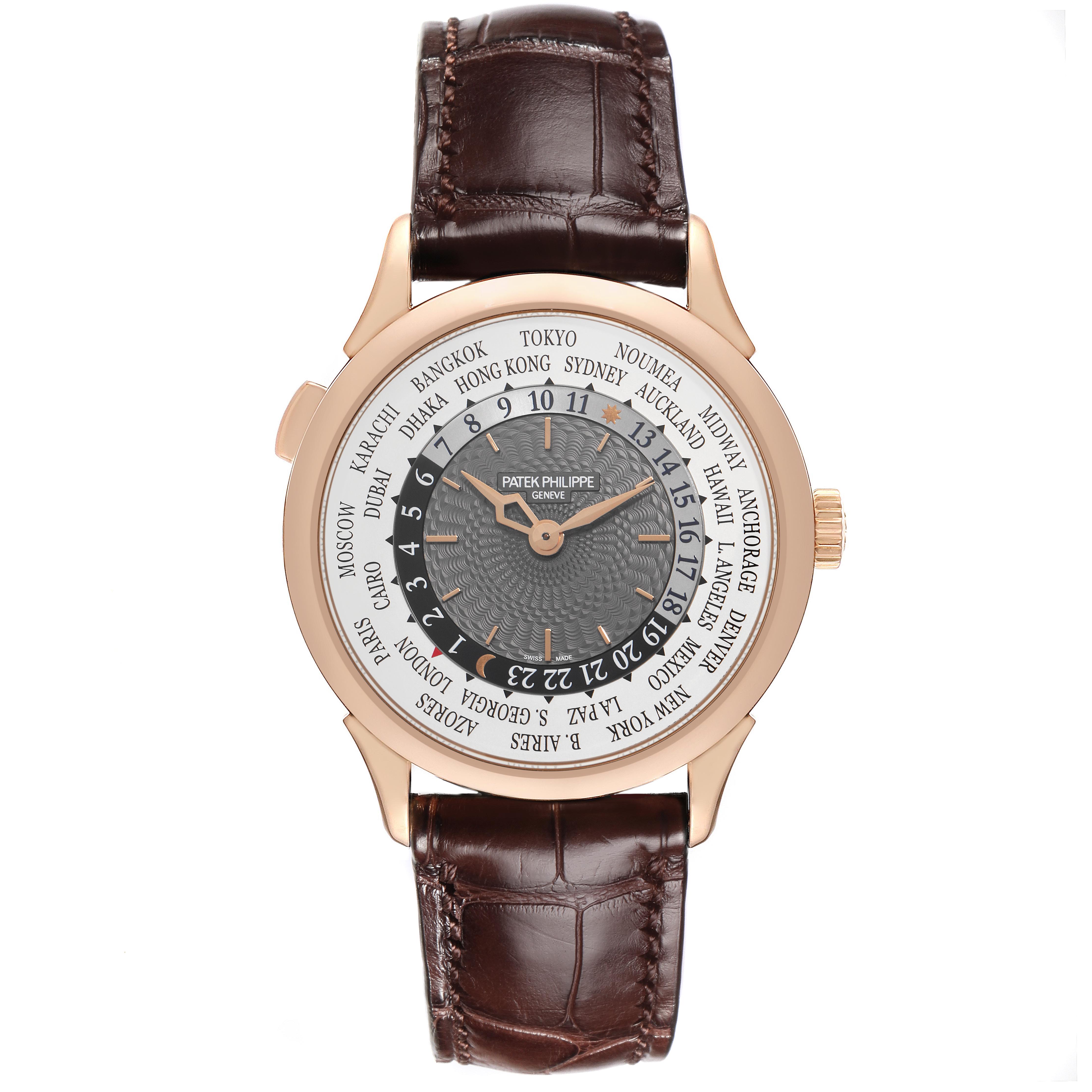 The image shows a front view of the Patek Philippe Complications 5230R-001 Men
s Rose Gold Grey Dial 5230R-001 Men
s Rose Gold Grey Dial watch, highlighting the dial with world cities and the leather strap.
