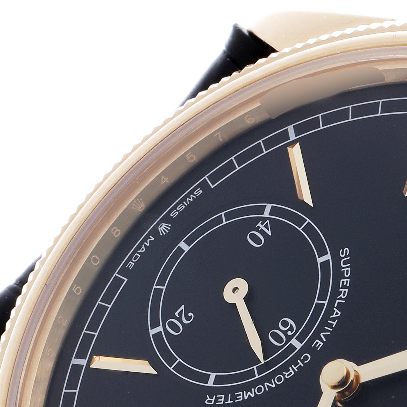 The image shows a close-up of the dial and bezel of the Rolex 1908 52508-0002 Men's Yellow Gold Black Dial 52508-0002 Men's Yellow Gold Black Dial, highlighting the subdial and hour markers.