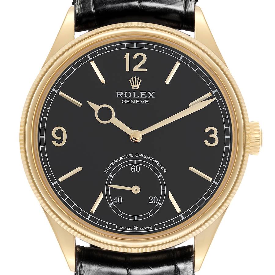 The Rolex 1908 watch is shown from the front, displaying its black dial, gold hour markers, and black leather strap.
