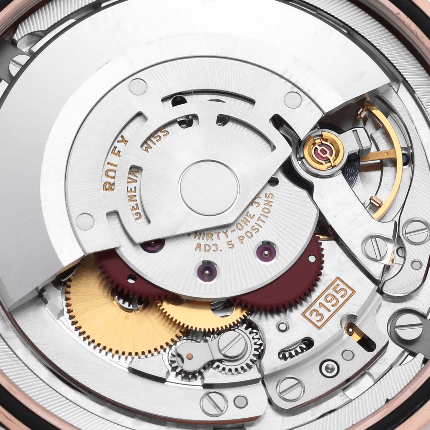 The image shows the movement components of a Rolex Cellini 50535 Men
s Rose Gold White Dial 50535 Men
s Rose Gold White Dial watch, including the rotor, gears, and balance wheel.