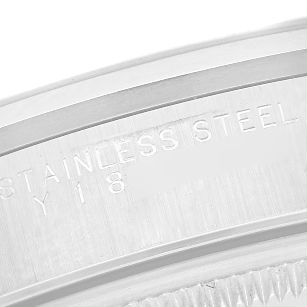 The image shows an engraved stainless steel part of the Rolex Date 15200 Men
s Stainless Steel Blue Dial 15200 Men
s Stainless Steel Blue Dial model, focusing on the case
s side.