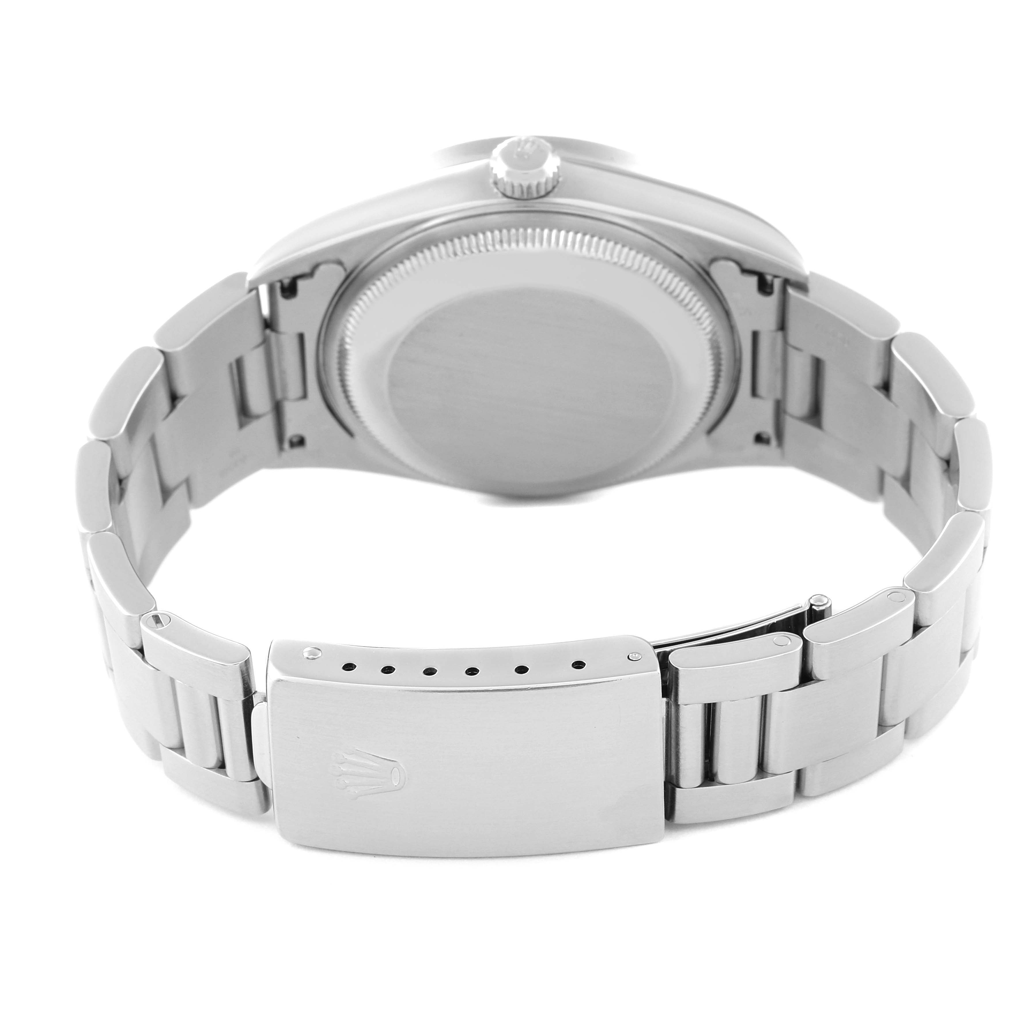 This image shows the back view of a Rolex Date 15210 Men's Stainless Steel Silver Dial 15210 Men's Stainless Steel Silver Dial model watch, highlighting its case back, bracelet, and clasp.