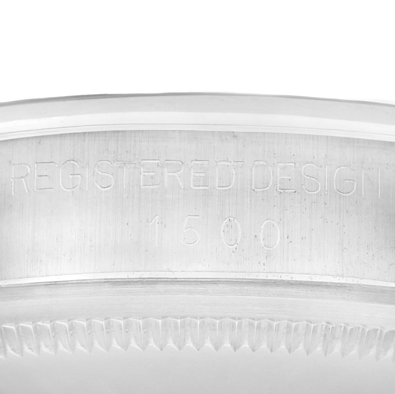 The image shows a close-up of the Rolex Date
s case with model number 1500 engraved on the inner bezel.