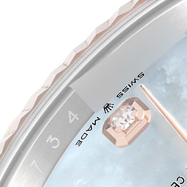 This image shows a close-up of the dial and edge of the bezel on a Rolex Datejust 41 126331 Men's Steel and Gold (two tone) Mother of Pearl Dial 126331 Men's Steel and Gold (two tone) Mother of Pearl Dial watch.