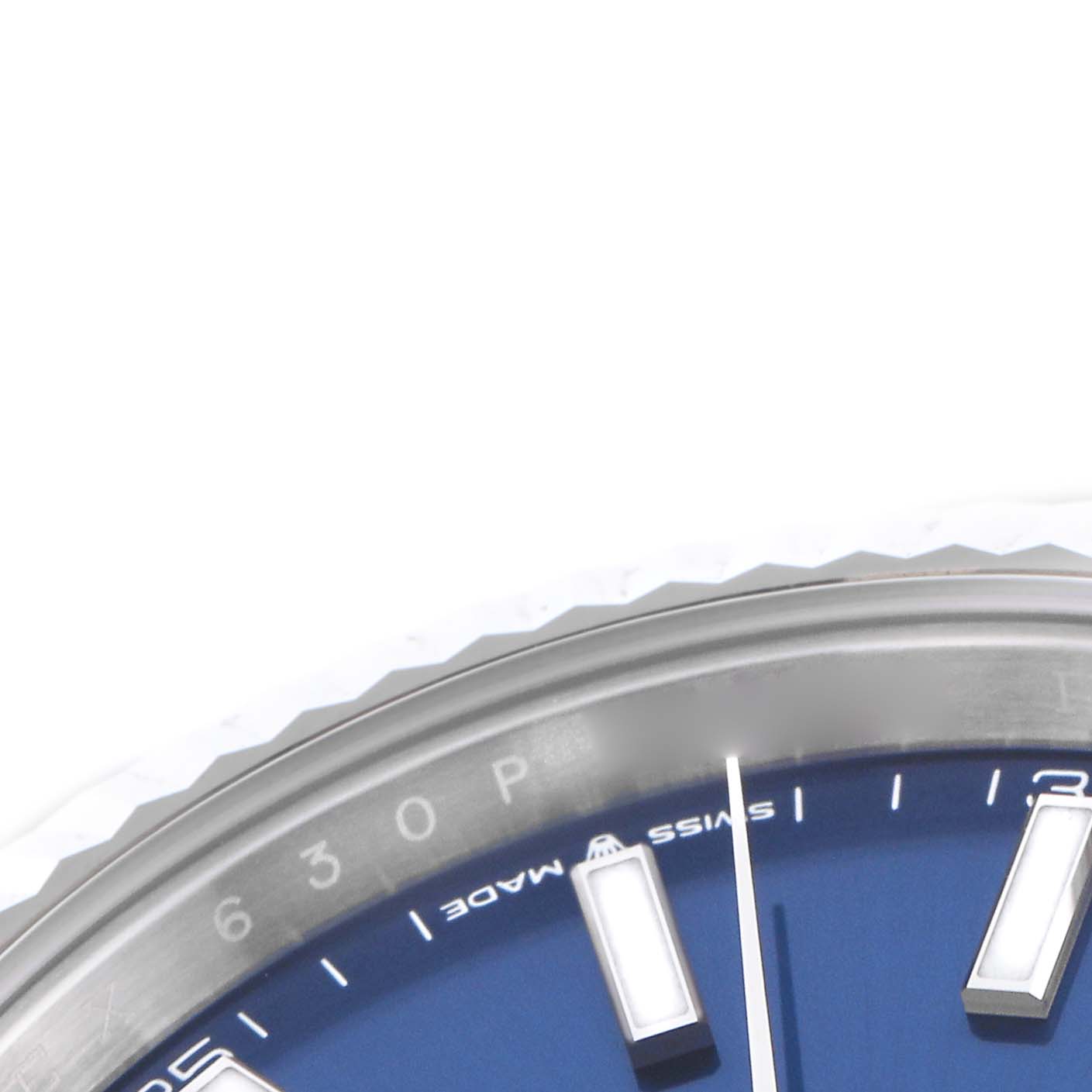 The image shows a close-up angle of a Rolex Datejust 41 126334 Men
s Stainless Steel Blue Dial 126334 Men
s Stainless Steel Blue Dial, highlighting the blue dial, indices, and bezel.