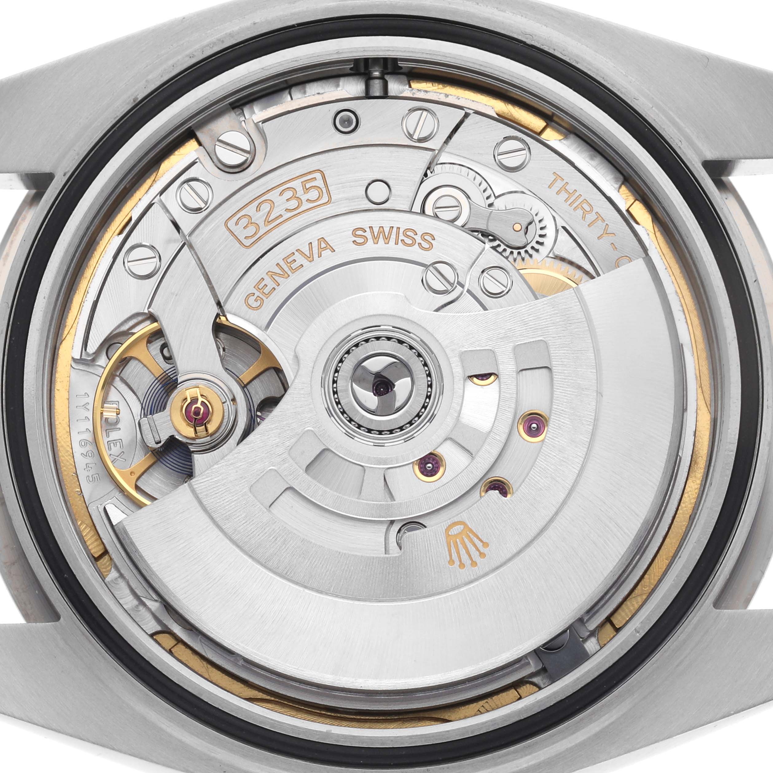 The image shows the movement of the Rolex Datejust 41 126334 Men
s Stainless Steel Blue Dial 126334 Men
s Stainless Steel Blue Dial, highlighting the intricate details of its 3235 caliber mechanism.