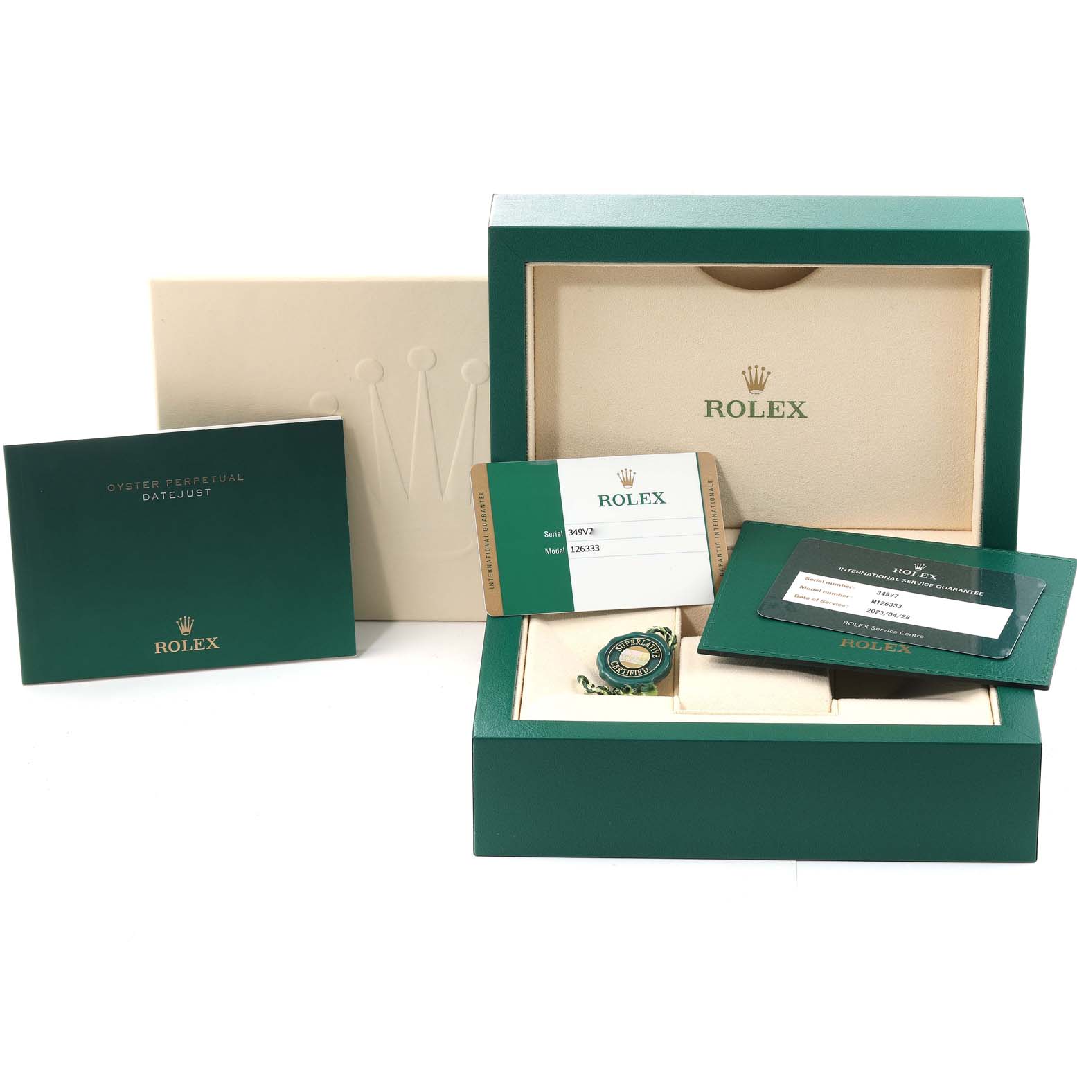 This image shows the packaging, warranty card, booklet, and accessories for the Rolex Datejust 41 126333 Men's Steel and Gold (two tone) Black Dial 126333 Men's Steel and Gold (two tone) Black Dial model.