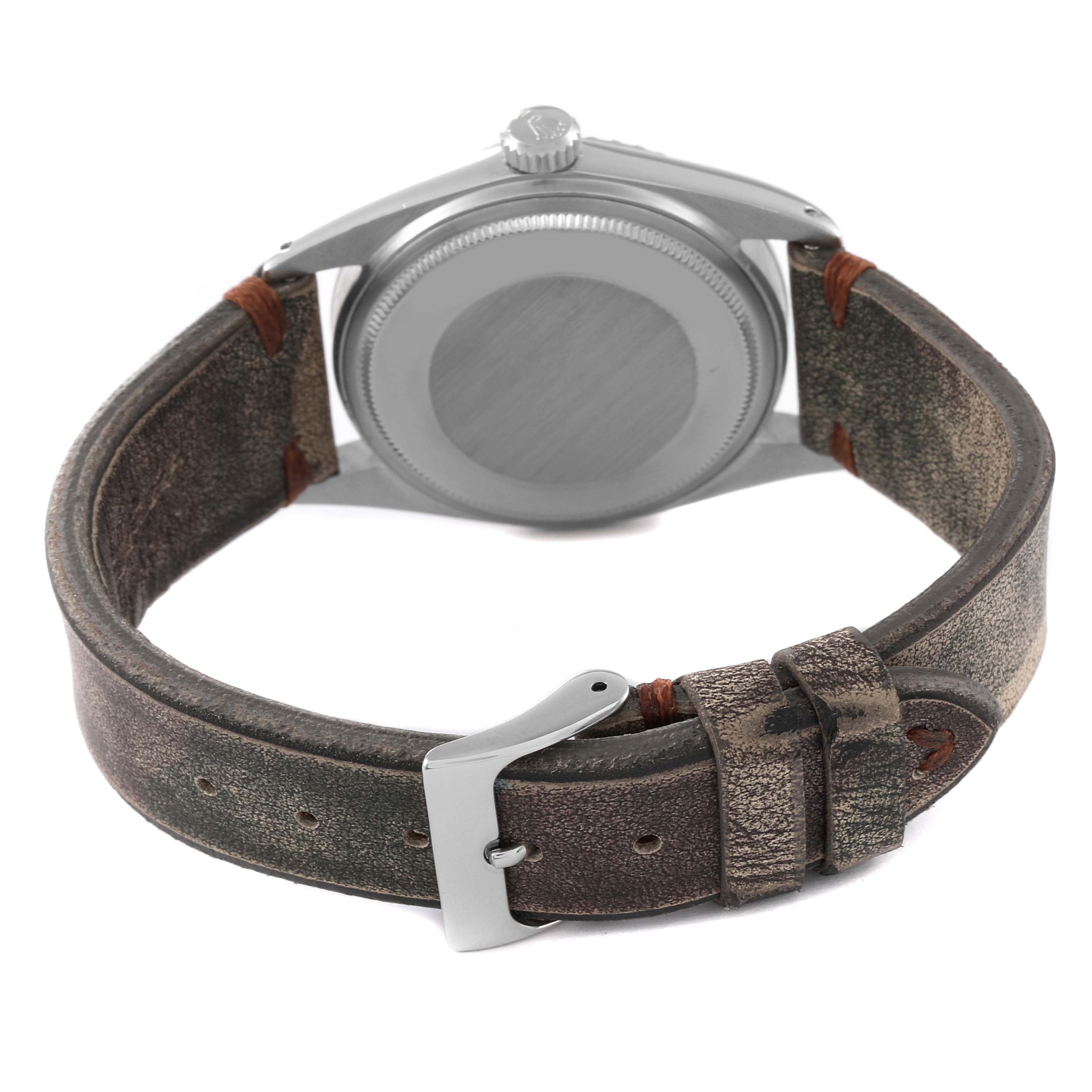 This image shows the back case and leather strap of the Rolex Vintage Collection 1603 Men's Stainless Steel Silver Dial 1603 Men's Stainless Steel Silver Dial model.