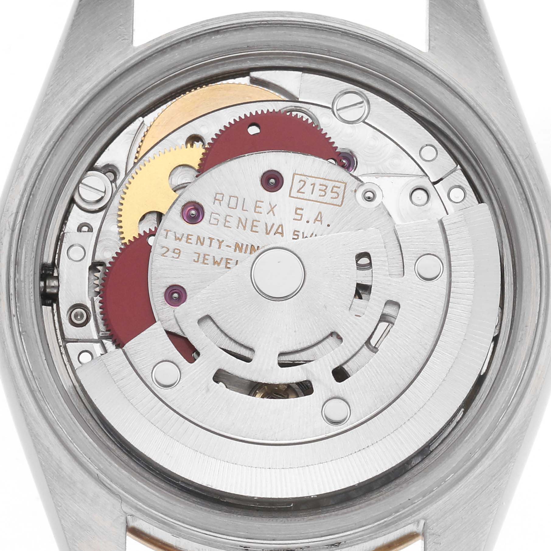The image shows the movement with gears and text inside a Rolex Datejust 69173 Women's Steel and Gold (two tone) Champagne Dial 69173 Women's Steel and Gold (two tone) Champagne Dial watch, viewed from the back.