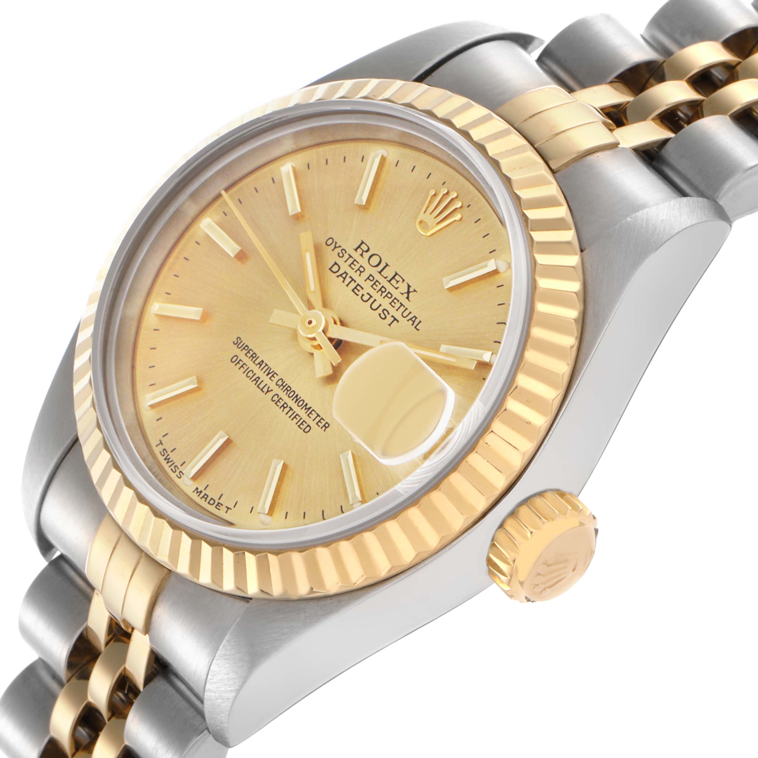 The Rolex Datejust 69173 Women's Steel and Gold (two tone) Champagne Dial 69173 Women's Steel and Gold (two tone) Champagne Dial watch is shown from an angled perspective, highlighting the gold bezel, dial, crown, and part of the bracelet.