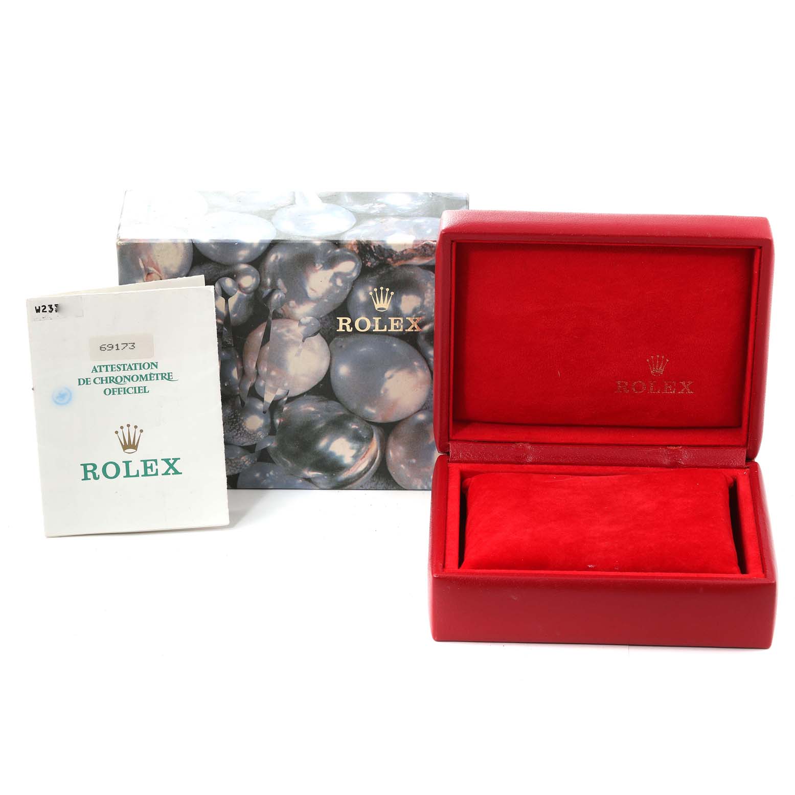 The image shows the packaging and certificate for a Rolex Datejust 69173 Women's Steel and Gold (two tone) Champagne Dial 69173 Women's Steel and Gold (two tone) Champagne Dial watch, including a red watch box and outer box.