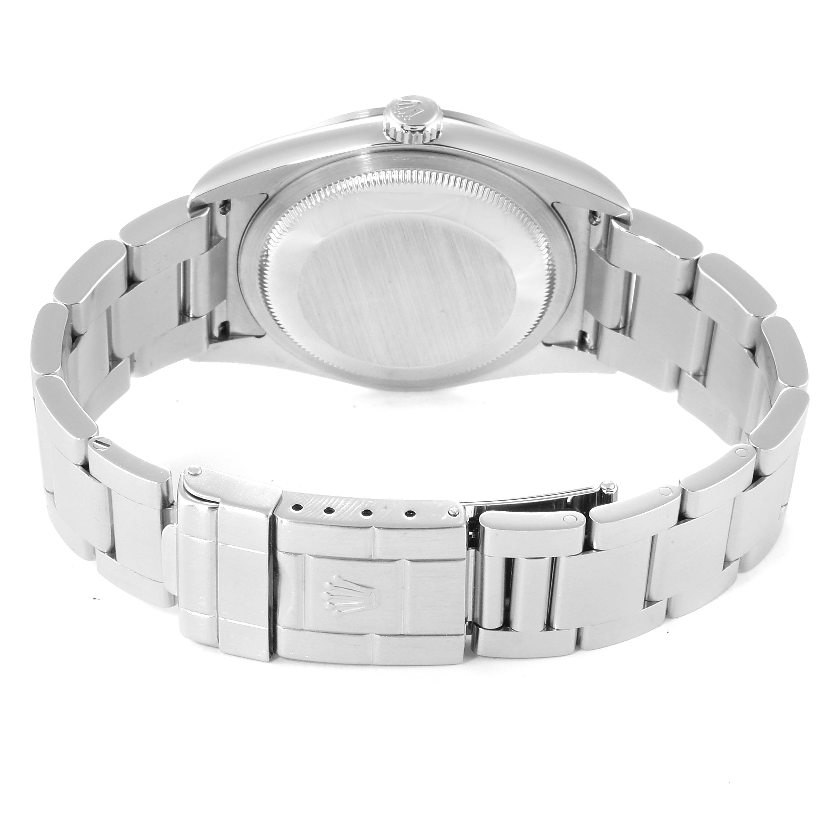 The image shows the back view of a Rolex Explorer 114270 Men
s Stainless Steel Black Dial 114270 Men
s Stainless Steel Black Dial watch, highlighting the case back and bracelet.