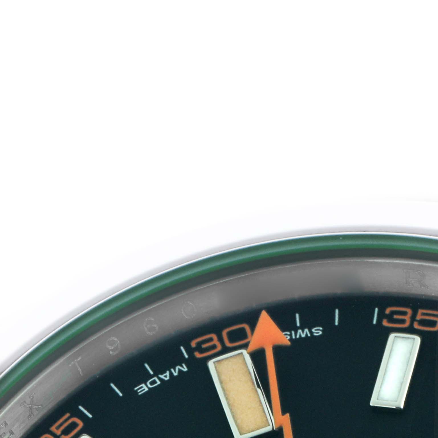 The image shows a close-up of the Rolex Milgauss 116400GV Men
s Stainless Steel Black Dial 116400GV Men
s Stainless Steel Black Dial watch dial, highlighting the hour markers and part of the seconds hand.