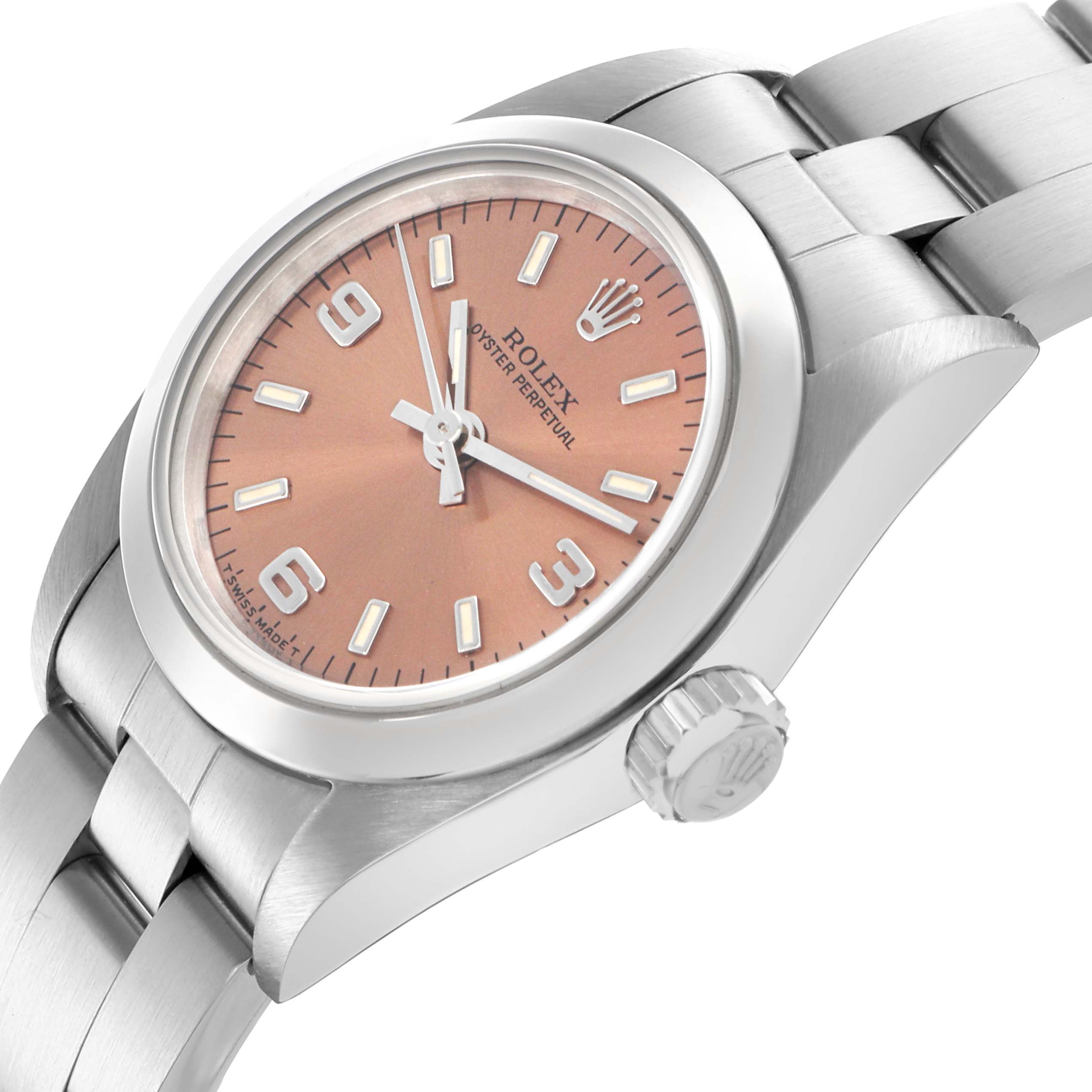 The Rolex Oyster Perpetual 67180 Women's Stainless Steel Pink Dial 67180 Women's Stainless Steel Pink Dial watch is shown at an angled view, highlighting the face, case, crown, and part of the bracelet.