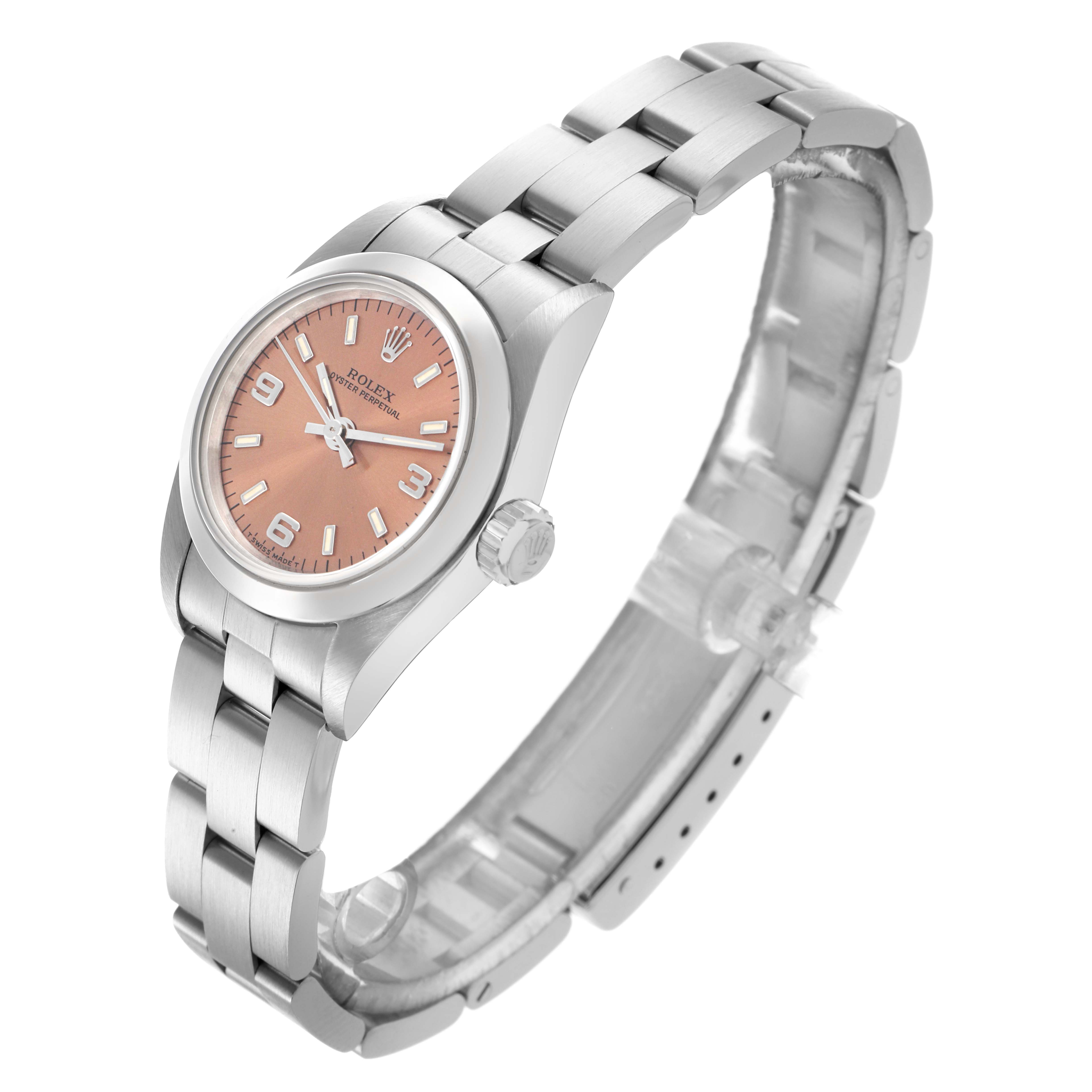 The Rolex Oyster Perpetual 67180 Women's Stainless Steel Pink Dial 67180 Women's Stainless Steel Pink Dial watch is shown at a three-quarter angle, highlighting the face, dial, and bracelet.