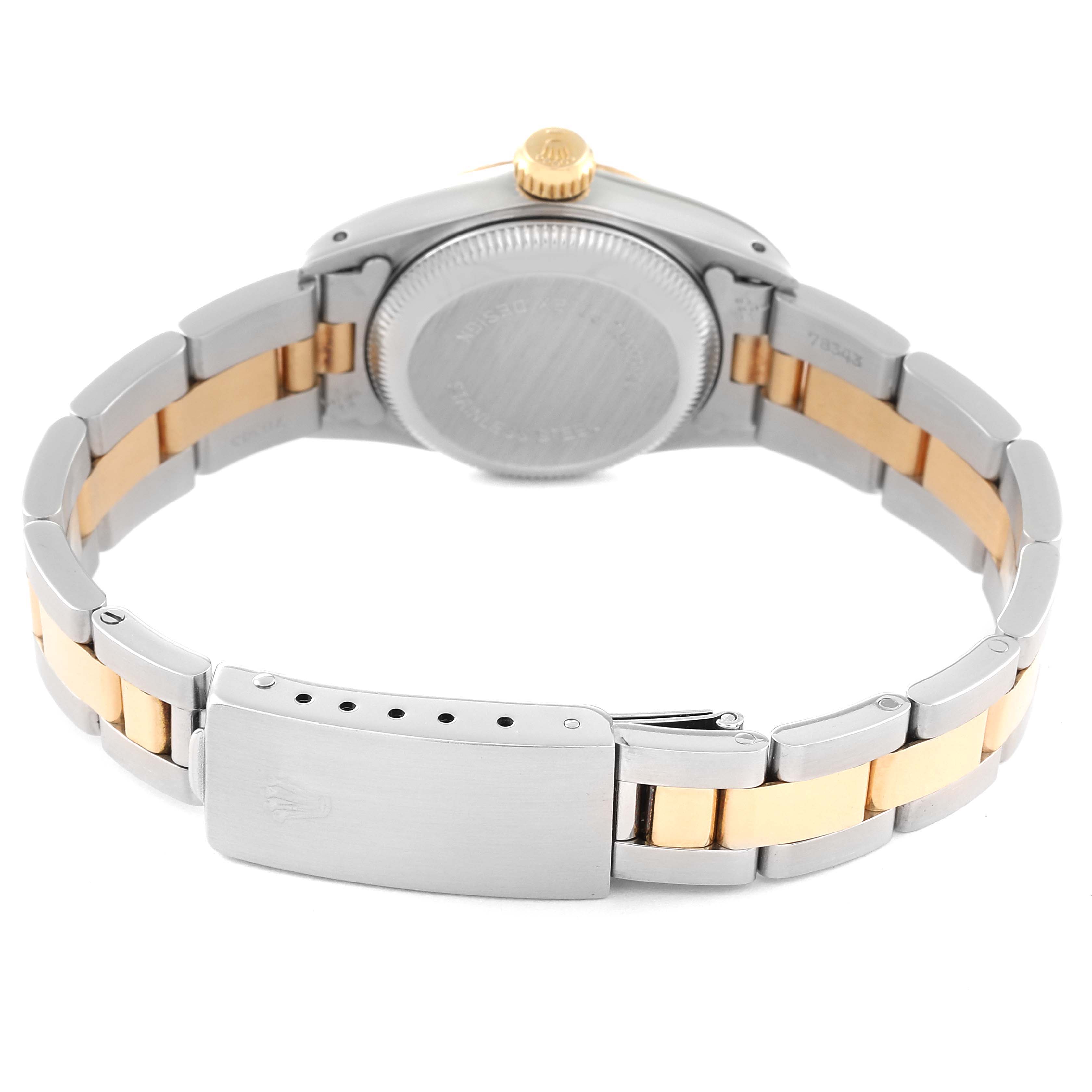 The image shows the back view of a Rolex Oyster Perpetual 67193 Women's Steel and Gold (two tone) Champagne Dial 67193 Women's Steel and Gold (two tone) Champagne Dial watch, focusing on the case back and the two-tone bracelet.