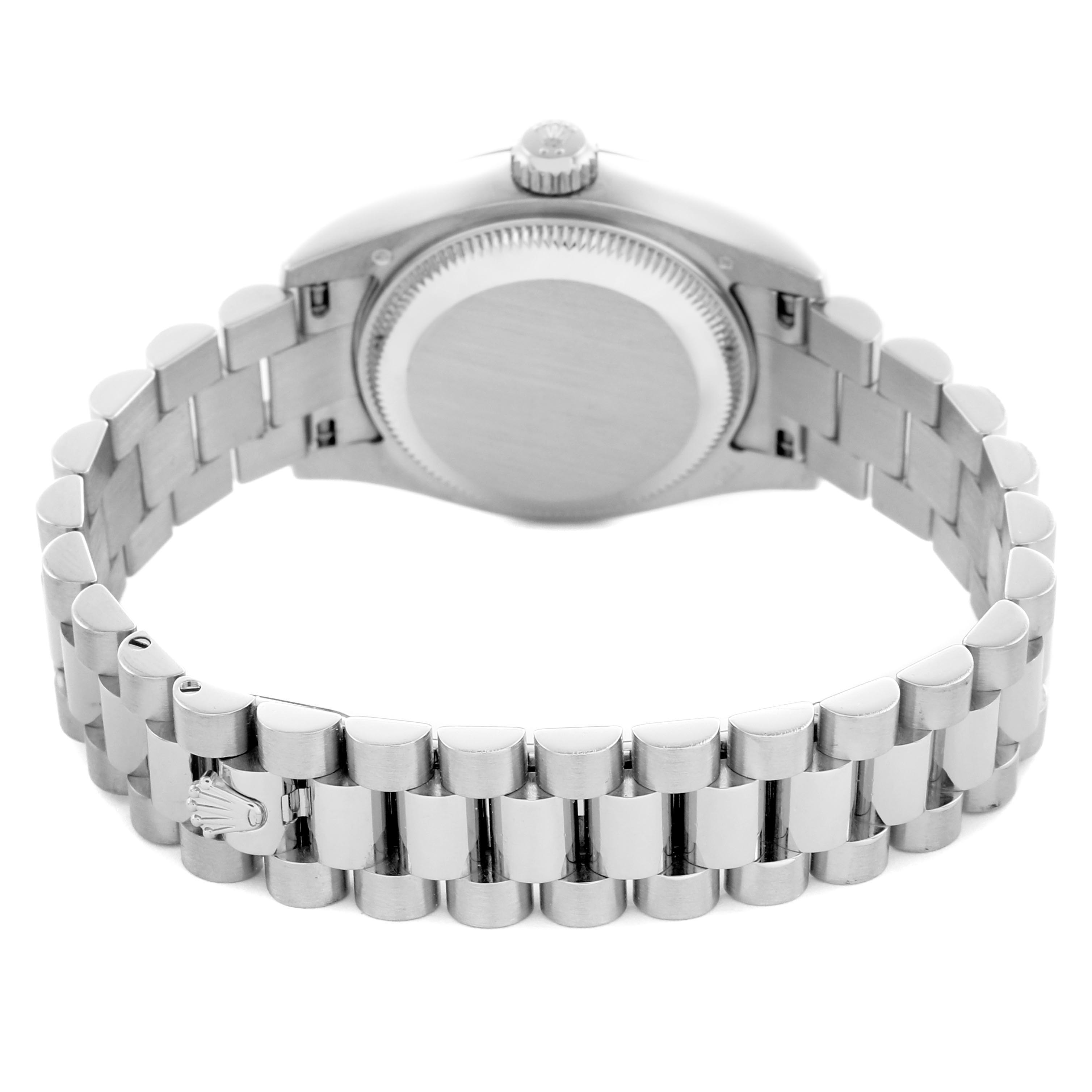 The image shows the back view of a Rolex President 179179 Women's White Gold Mother of Pearl Dial 179179 Women's White Gold Mother of Pearl Dial watch, highlighting the case back and the linked bracelet.